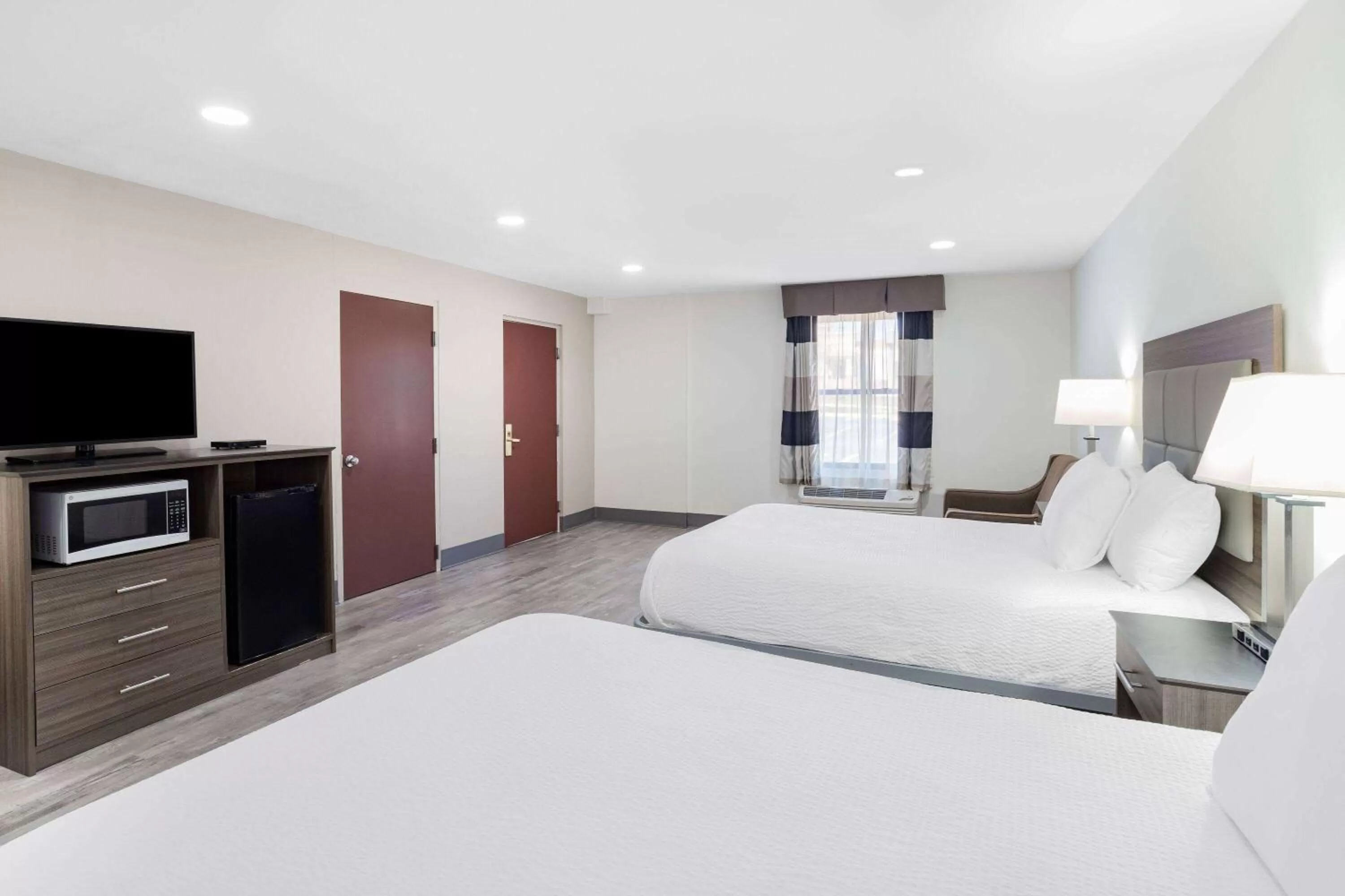 Bed in Ramada by Wyndham Hendersonville