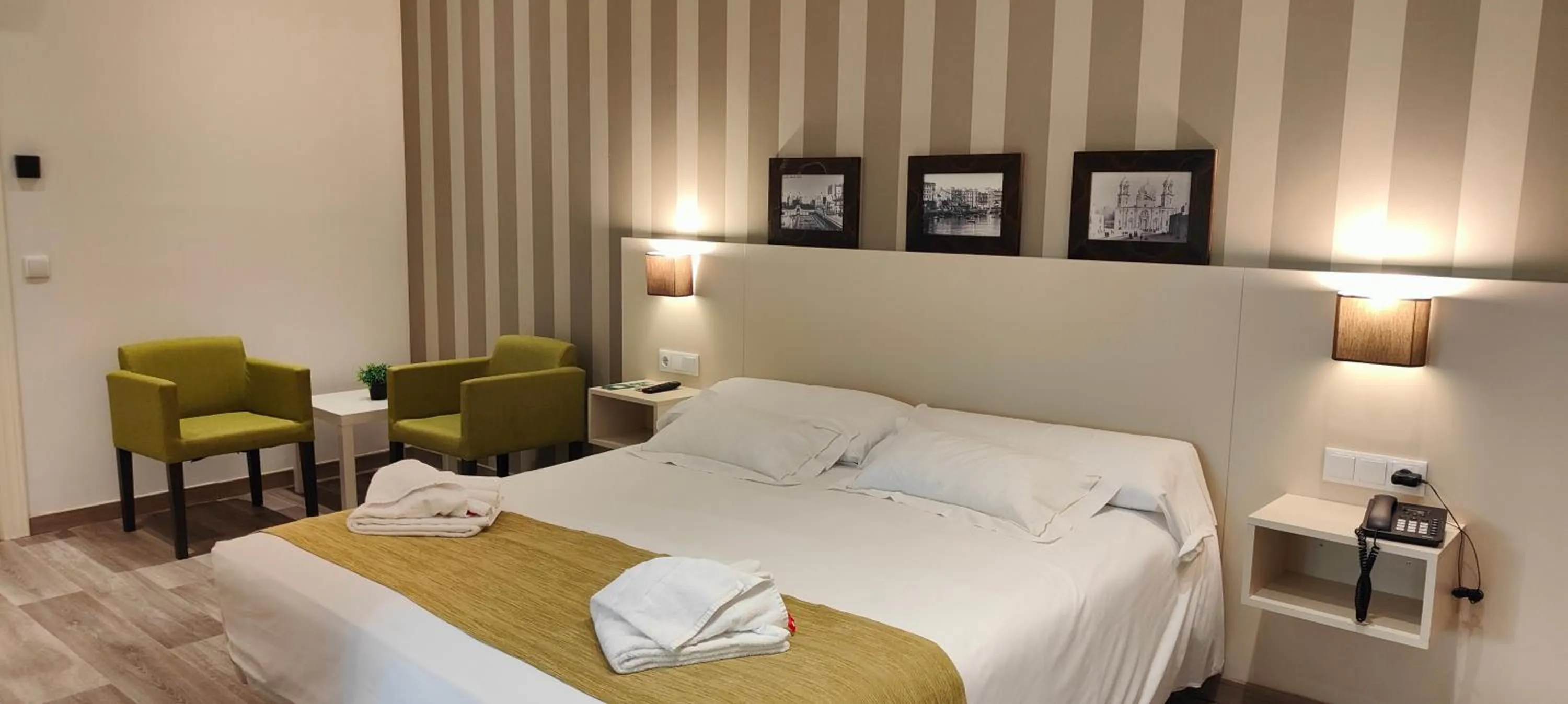 Bed in Hotel San Lorenzo Boutique Plaza