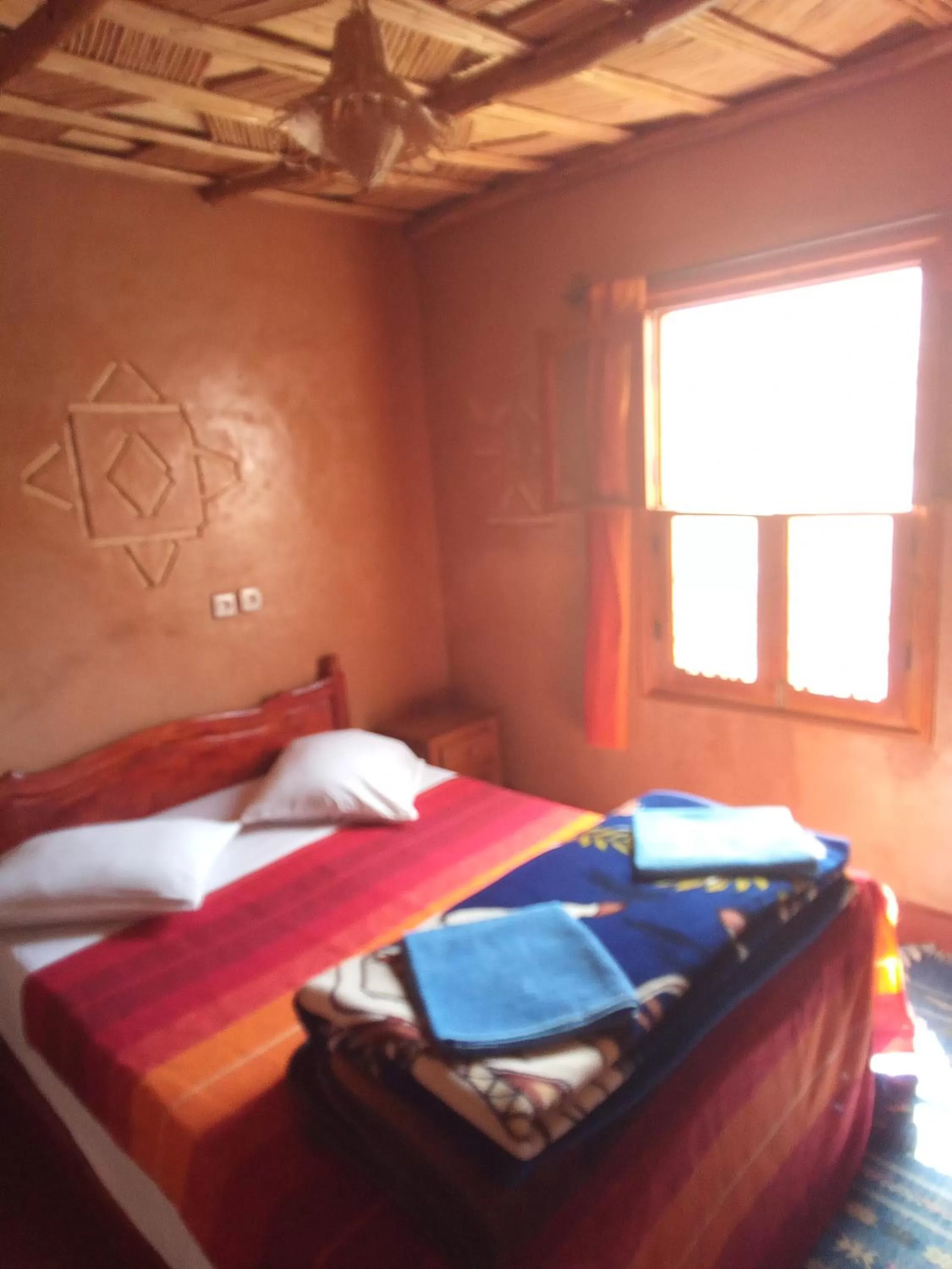 Bed in Maison d'Hôte Valentine