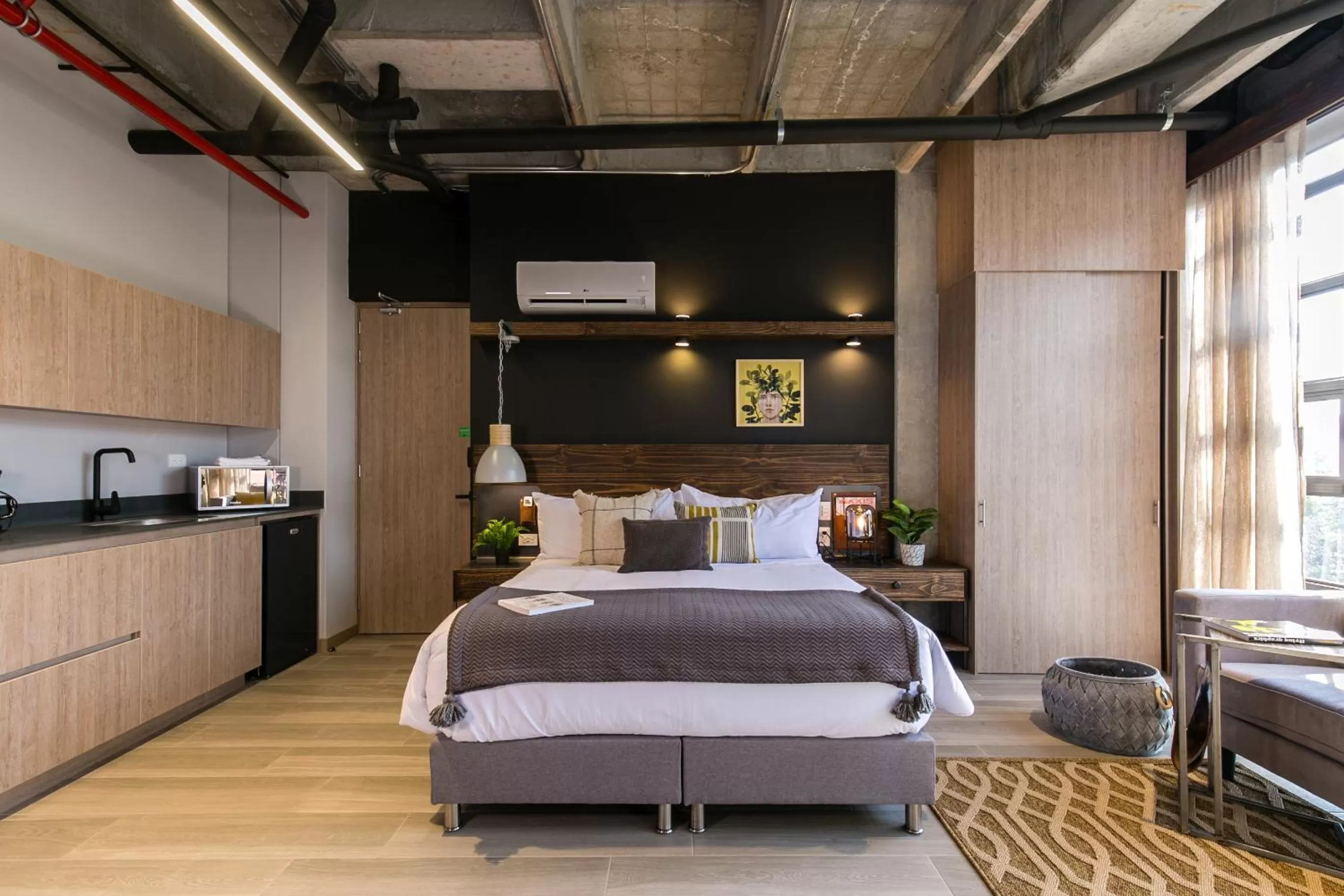 Bed in Factory Lofts Hotel