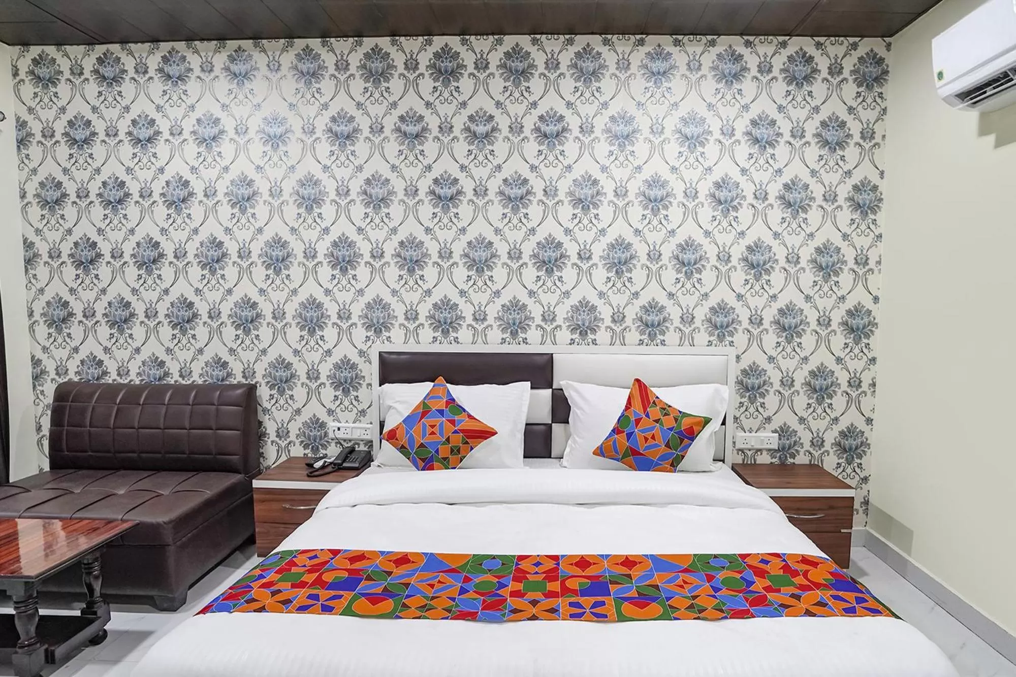 Bed in FabHotel Rajdhani