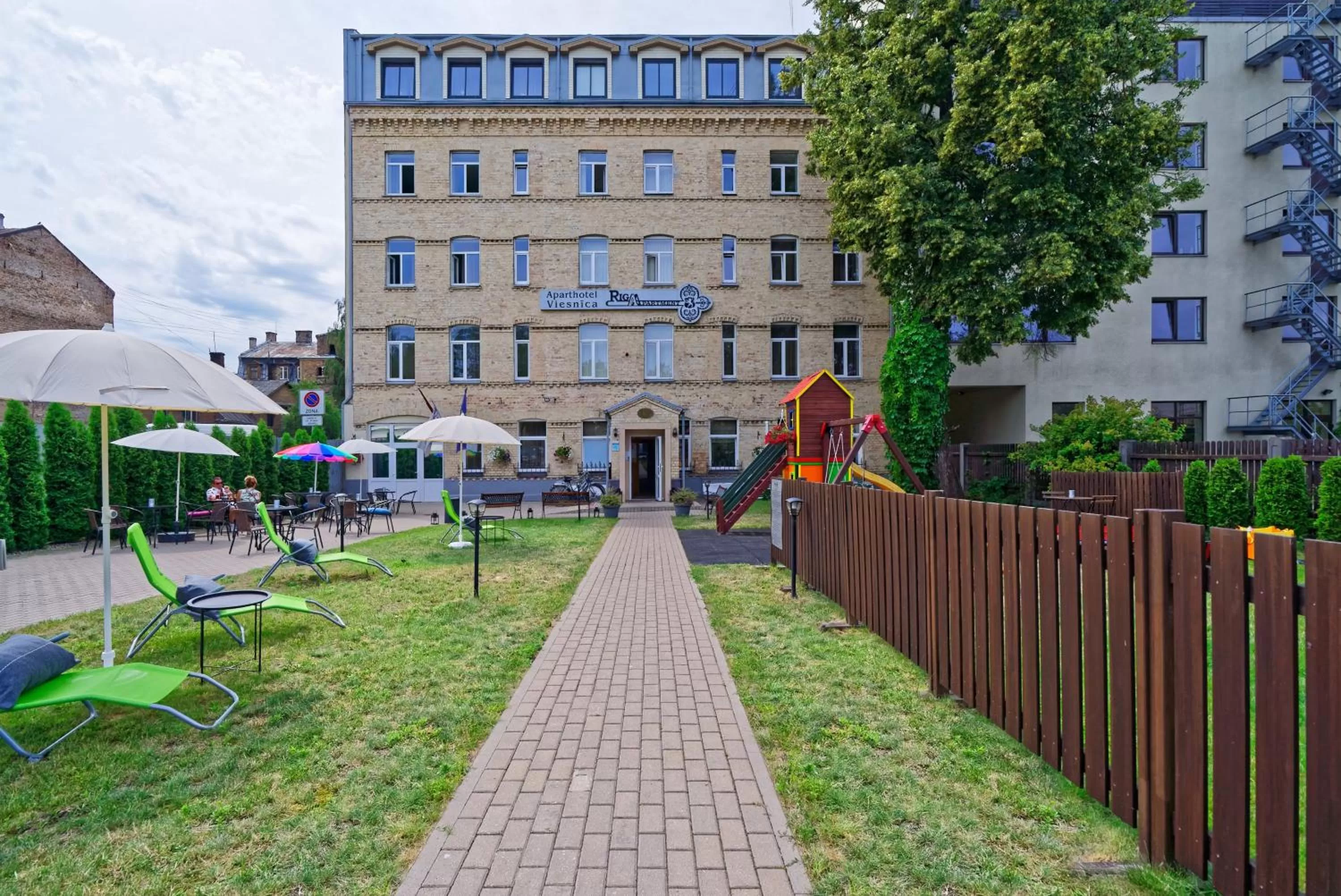 Property building in RIGAAPARTMENT SONADA Self-Service Aparthotel - Private Parking