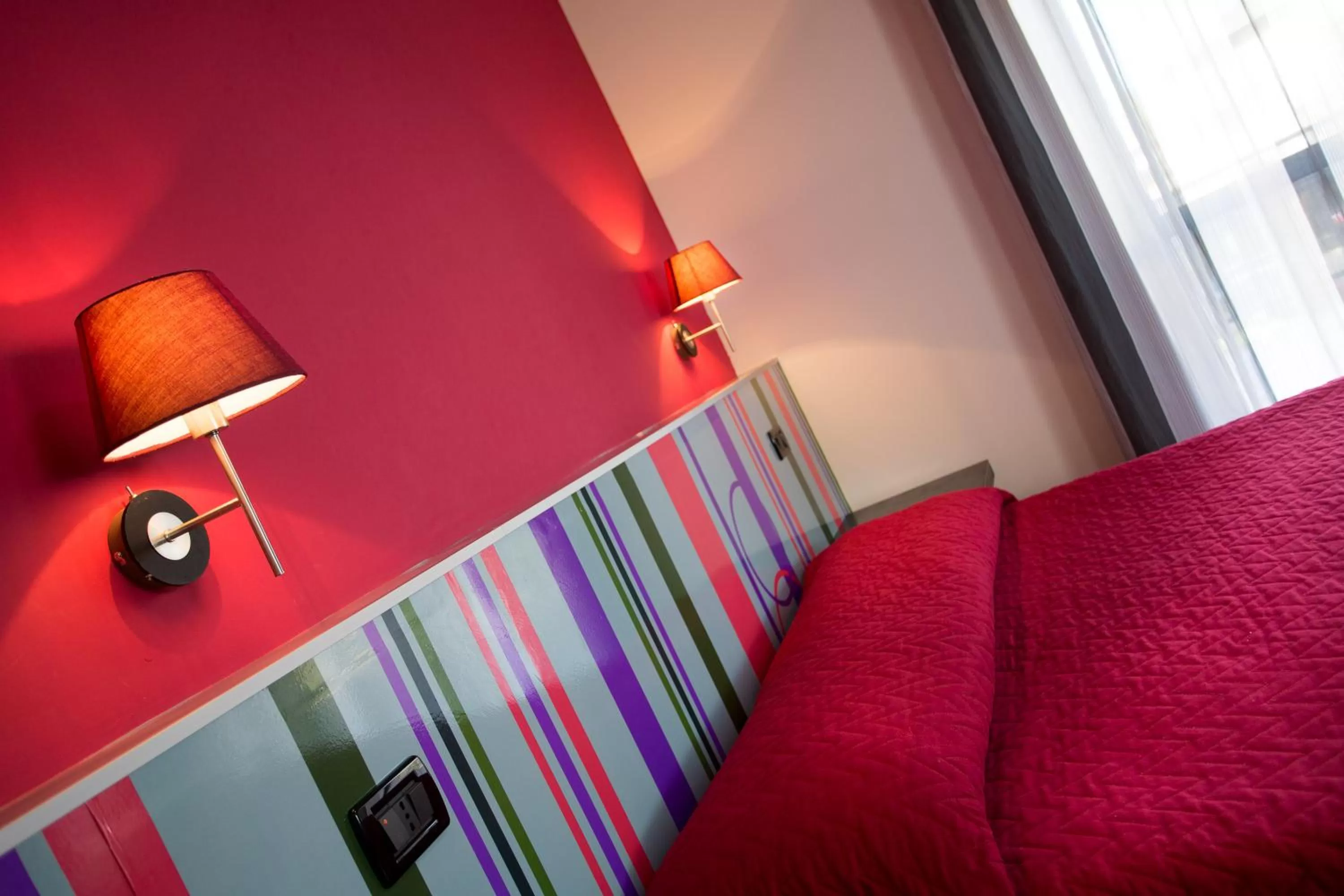 Bed in Hotel Le Ceramiche