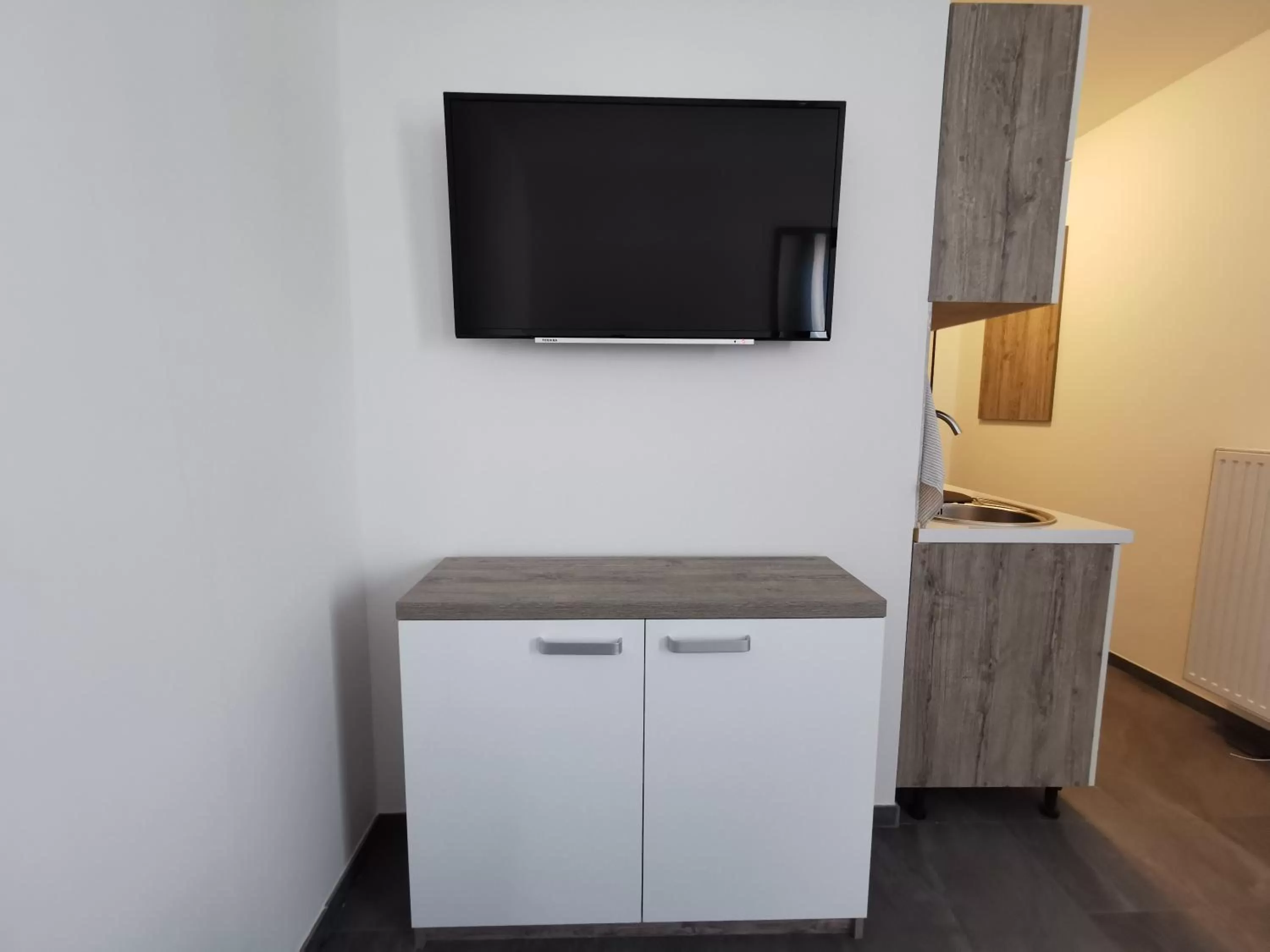 Communal lounge/ TV room in HP Apartments