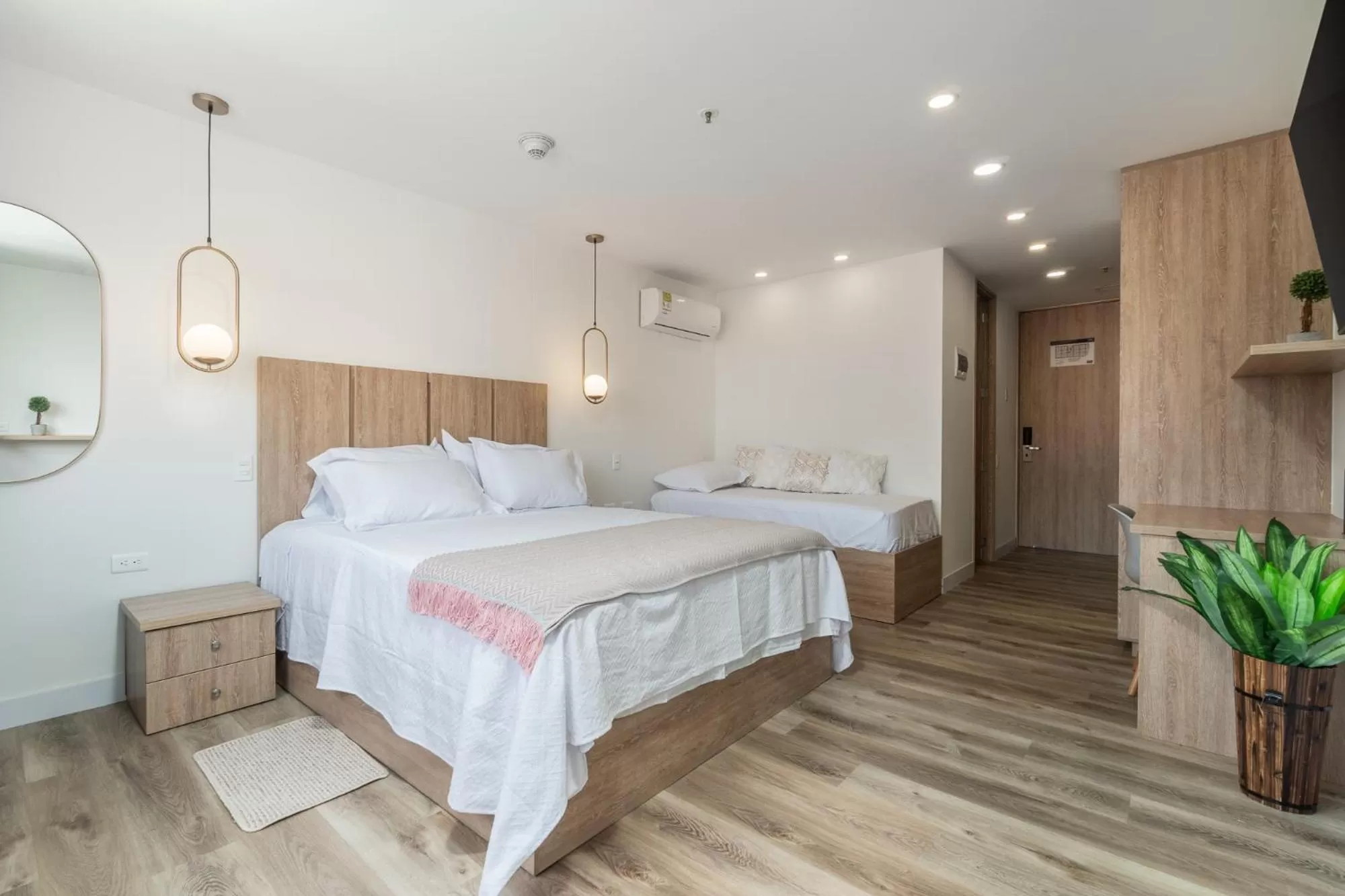 Bed in Apartamentos Go Living & Suites by HOUSY HOST