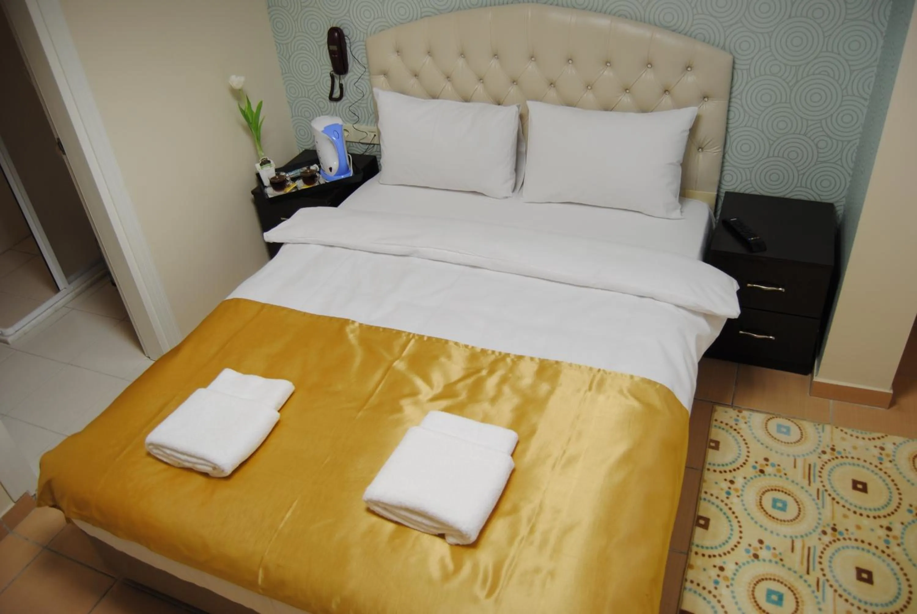 Bed in Lotus Hotel