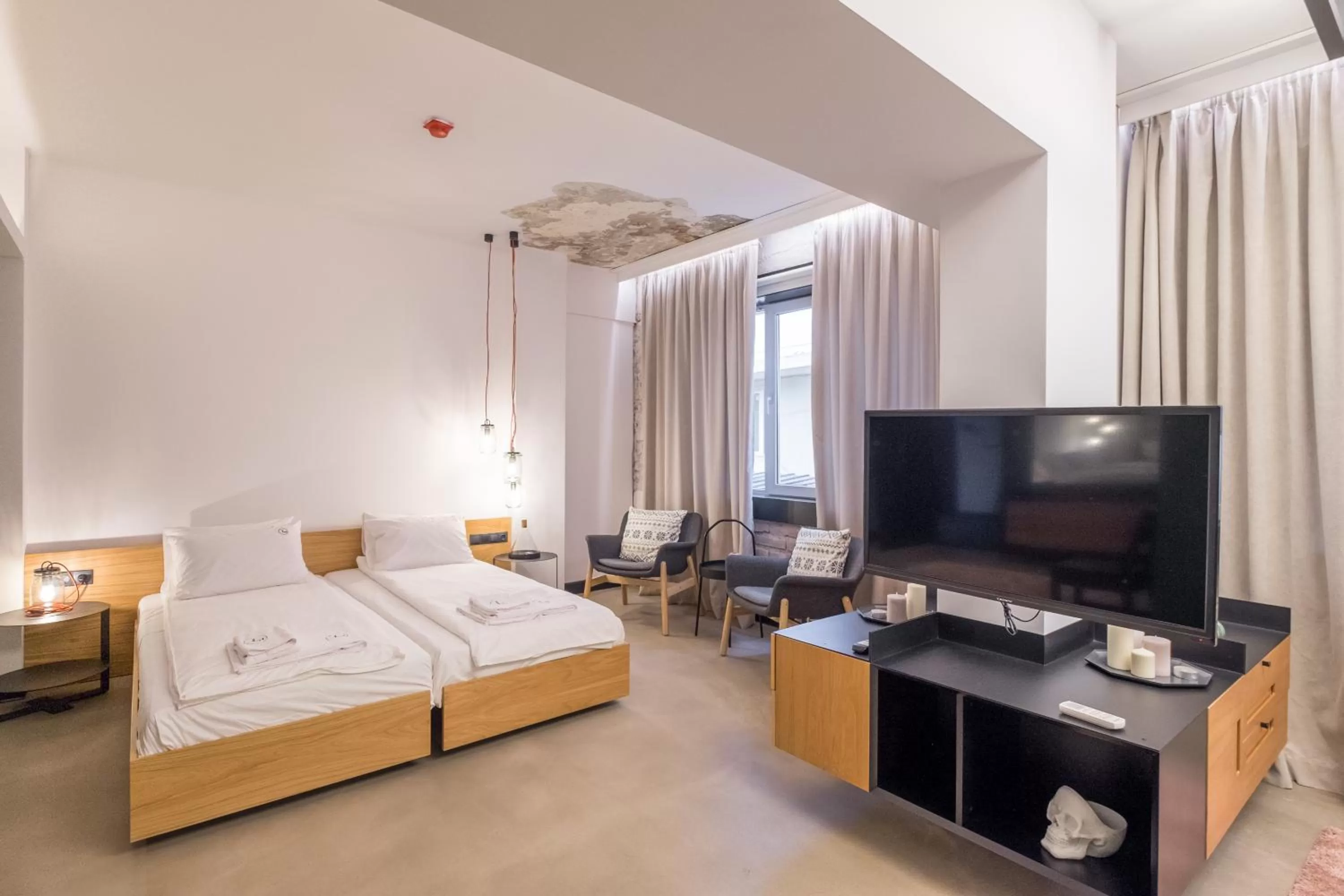 Bed in R34 Boutique Hotel