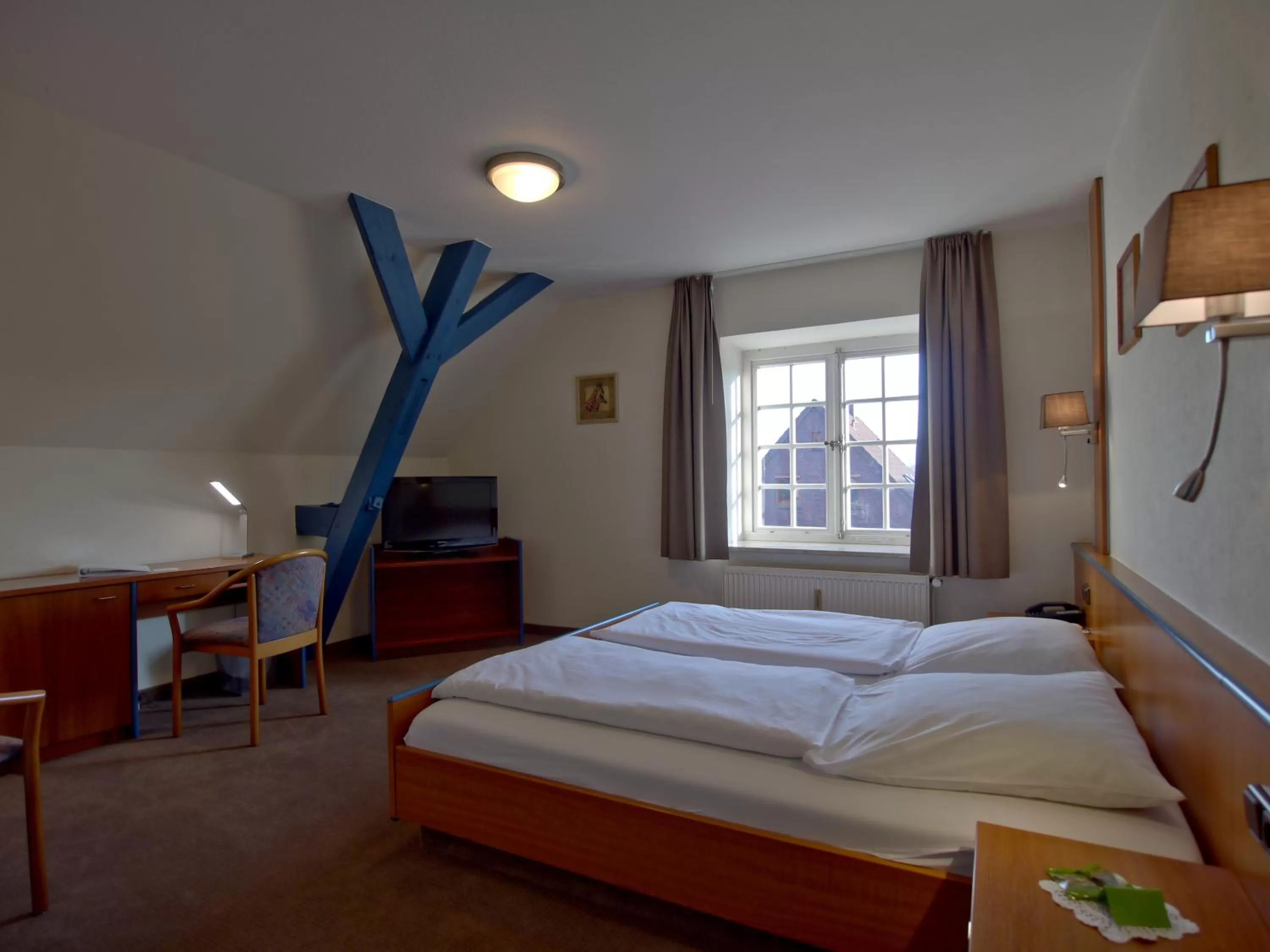 Bed in Hotel Friesische Wehde