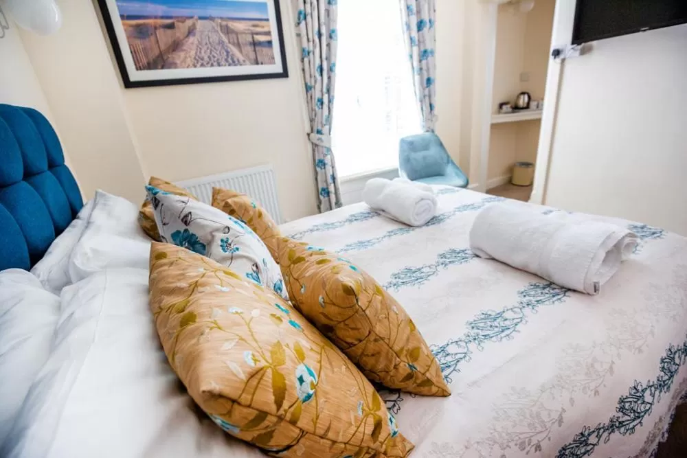 Bed in The Red Lion Hotel