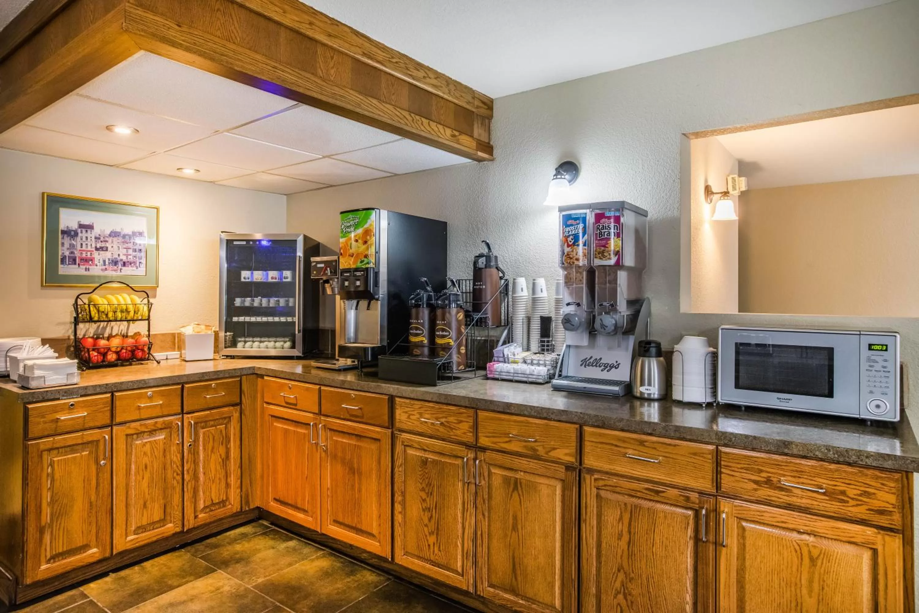 Coffee/tea facilities, Kitchen/Kitchenette in Super 8 by Wyndham Wichita East