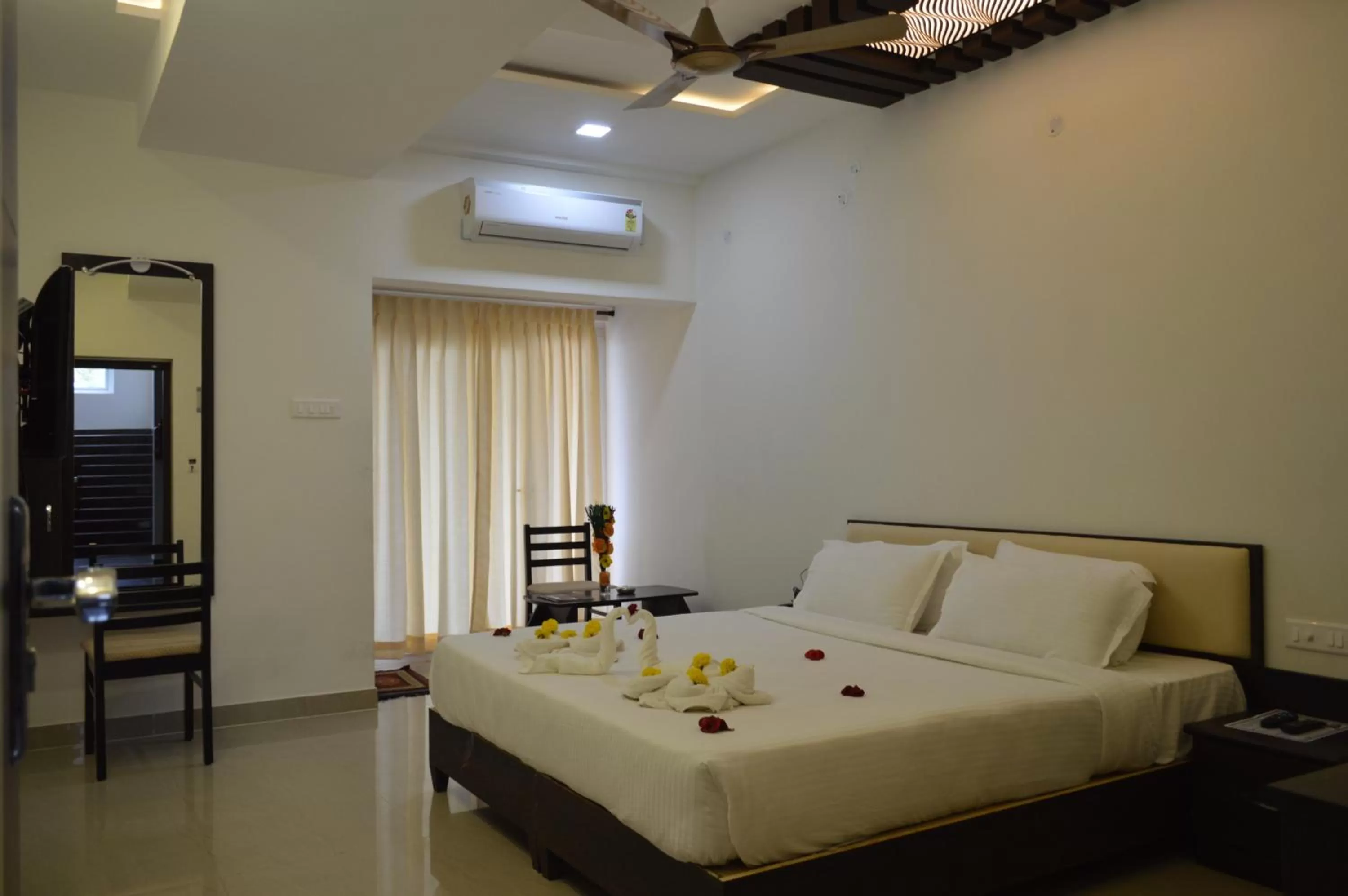 Bed in Hotel Ambai Grand