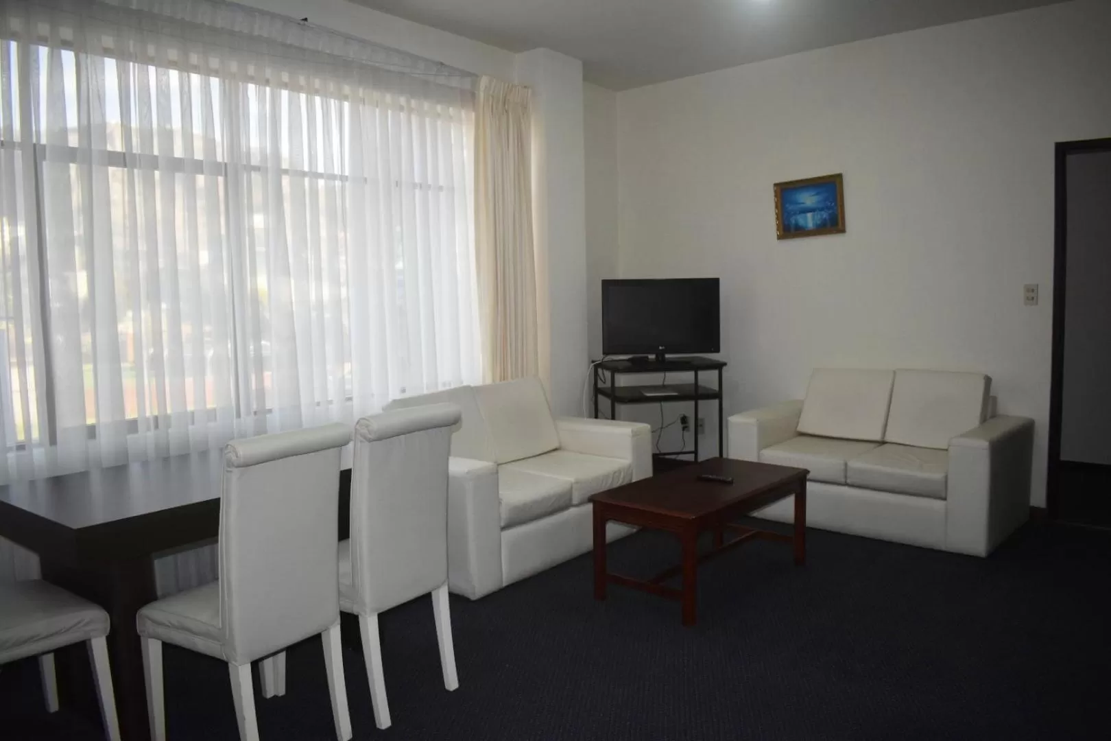 Living room in Delfines Apart Hotel