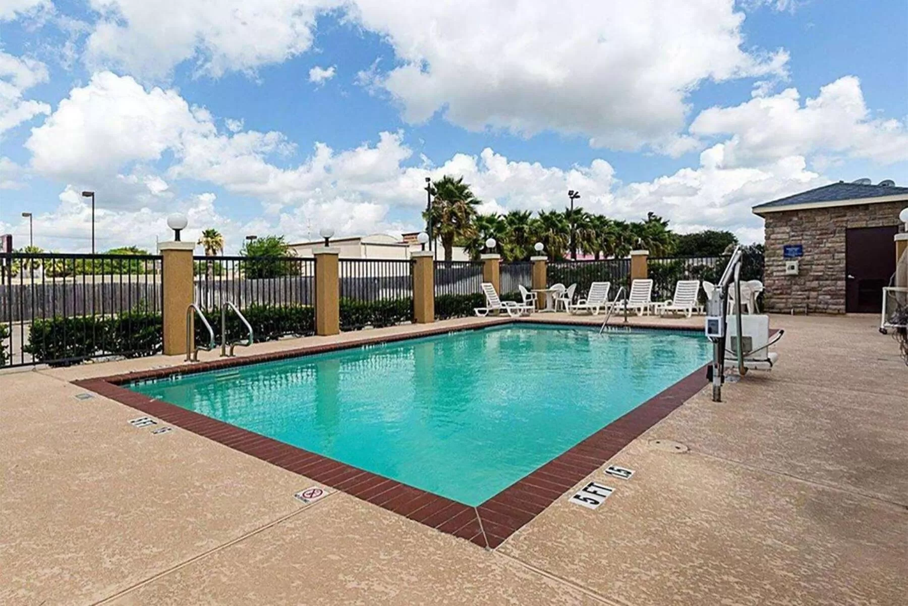 Pool view in Days Inn & Suites by Wyndham Houston / West Energy Corridor