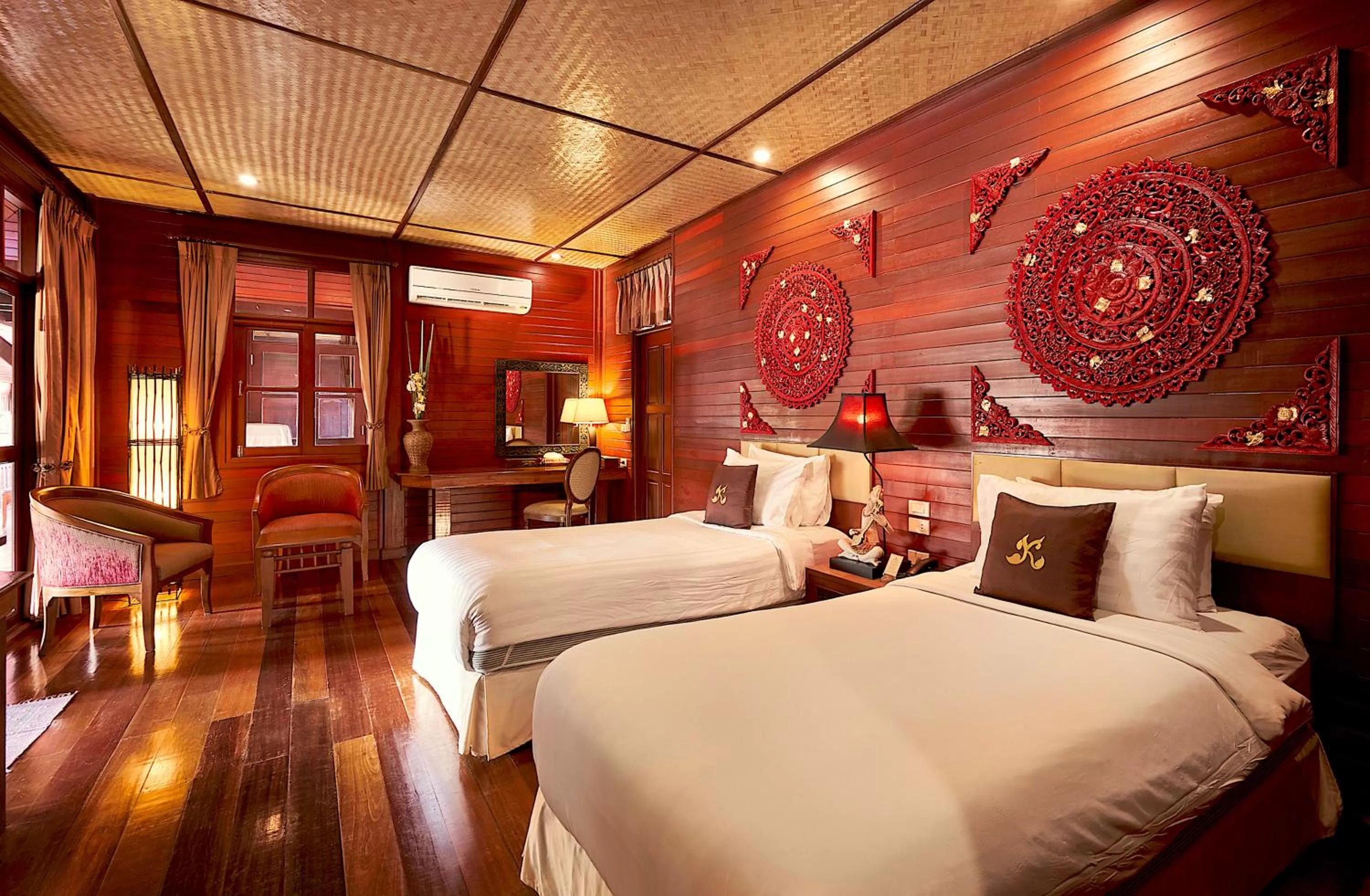 Bed in Ruenkanok Thaihouse Resort