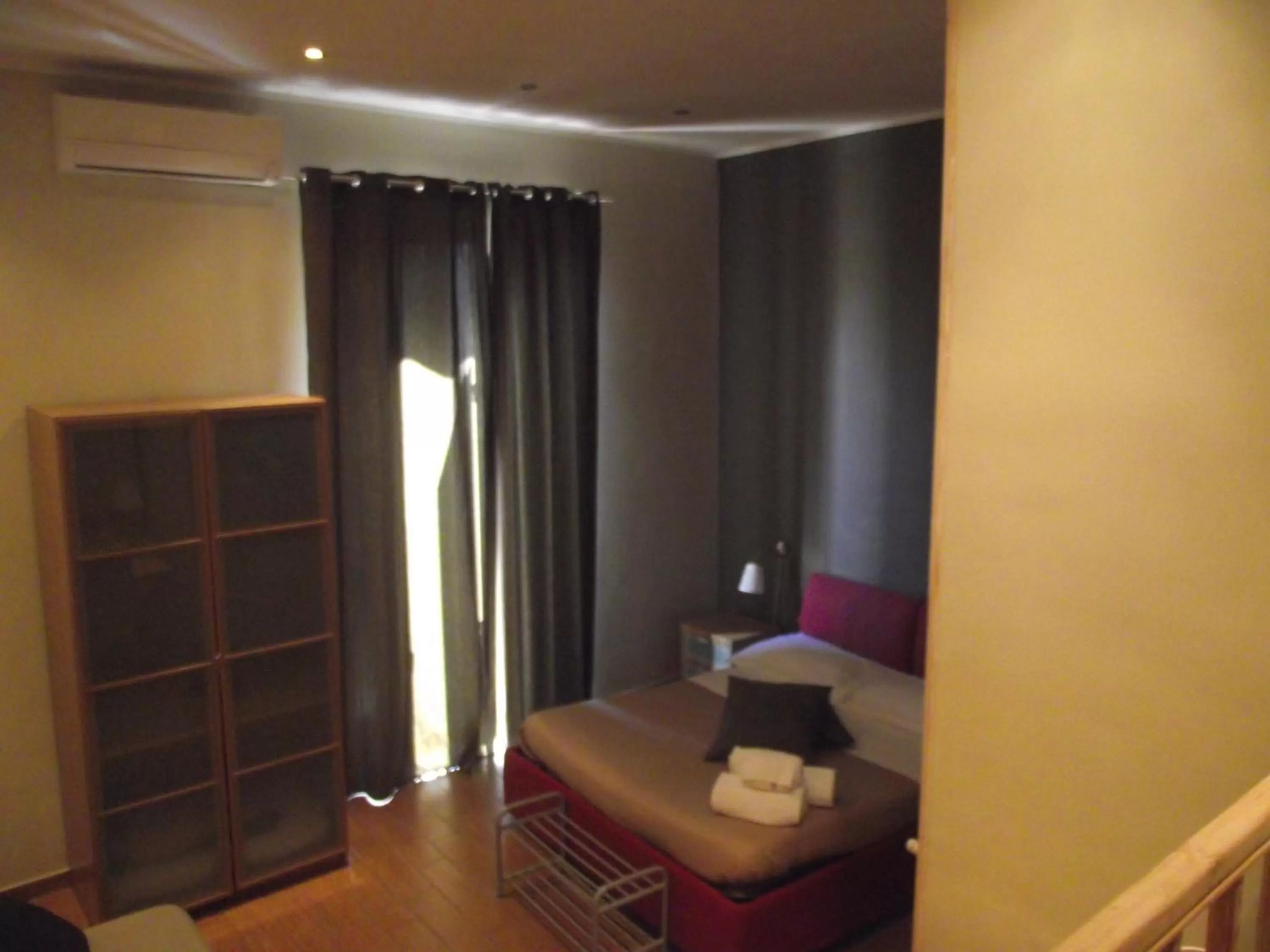 Bed, Seating Area in XX Miglia