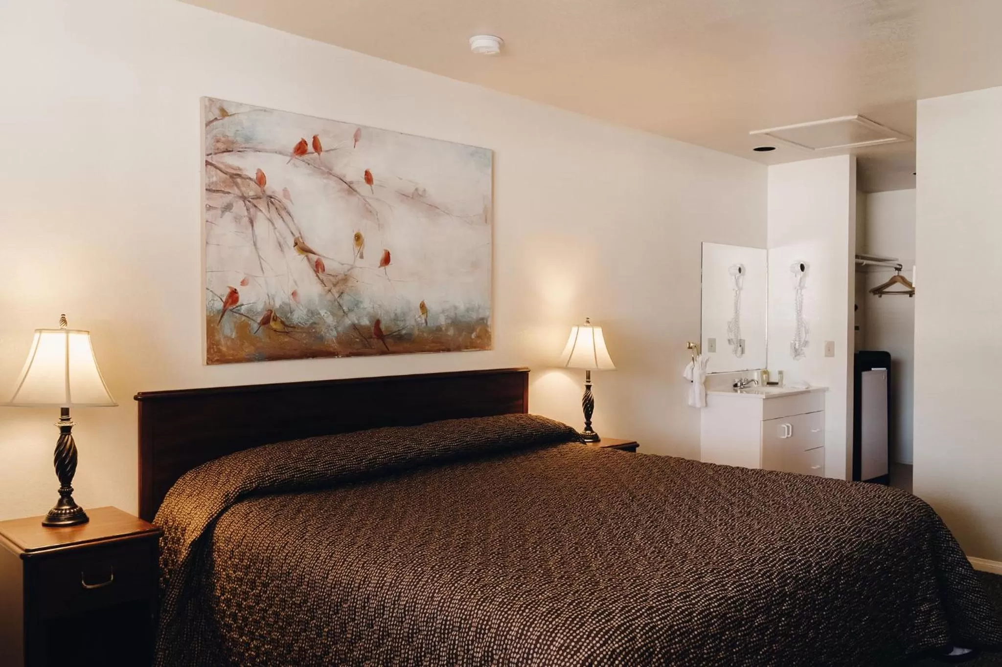 Bed in Vintage Lakeside Inn