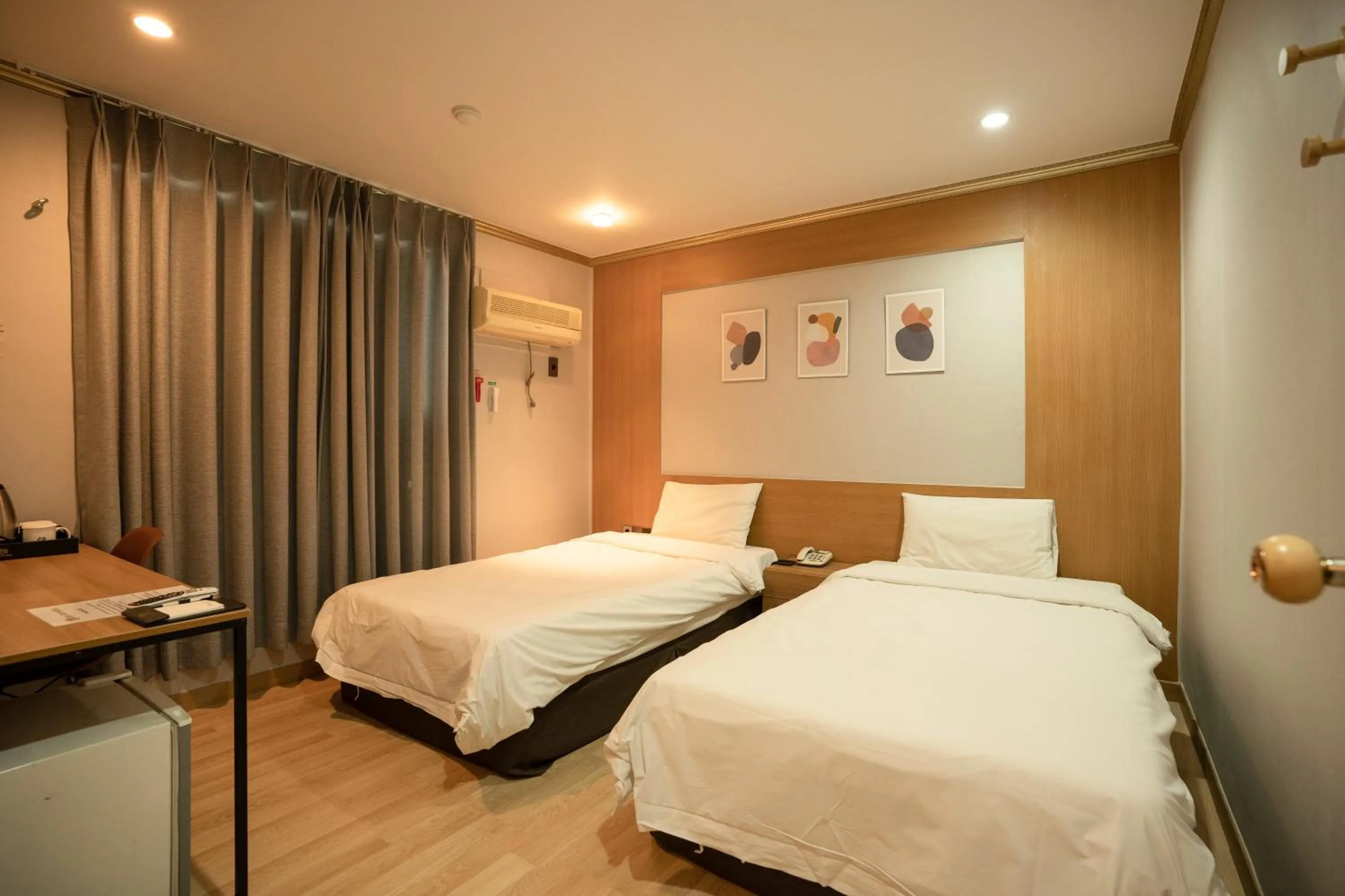 Bed in Jeju Stay Hotel