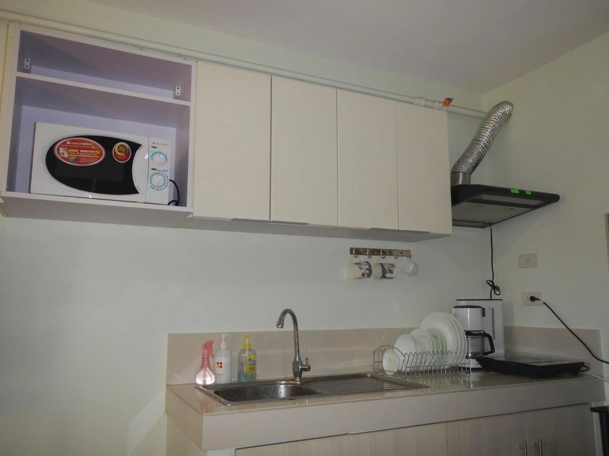 Kitchen or kitchenette in One Oasis Condotel