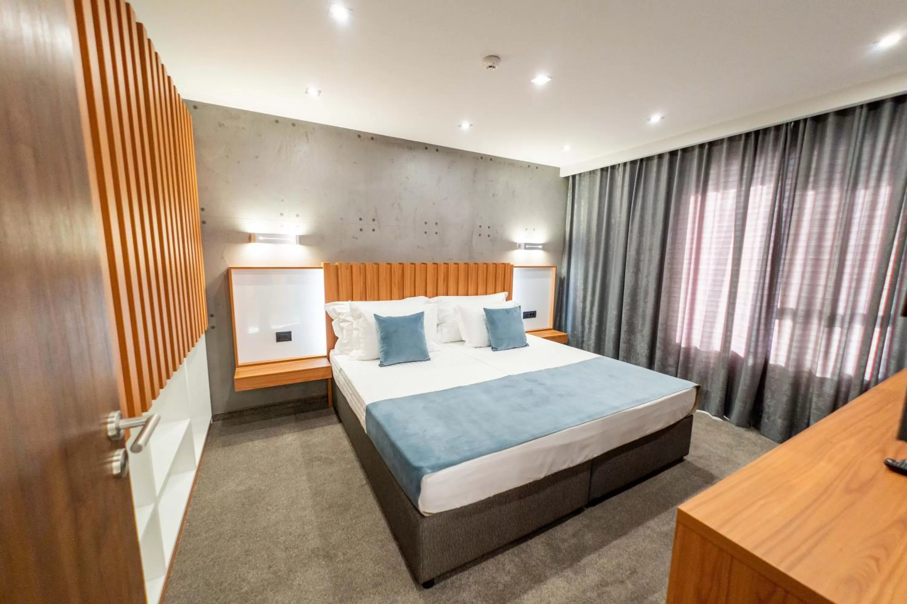 Bed in 103 Degrees Hotel & Spa