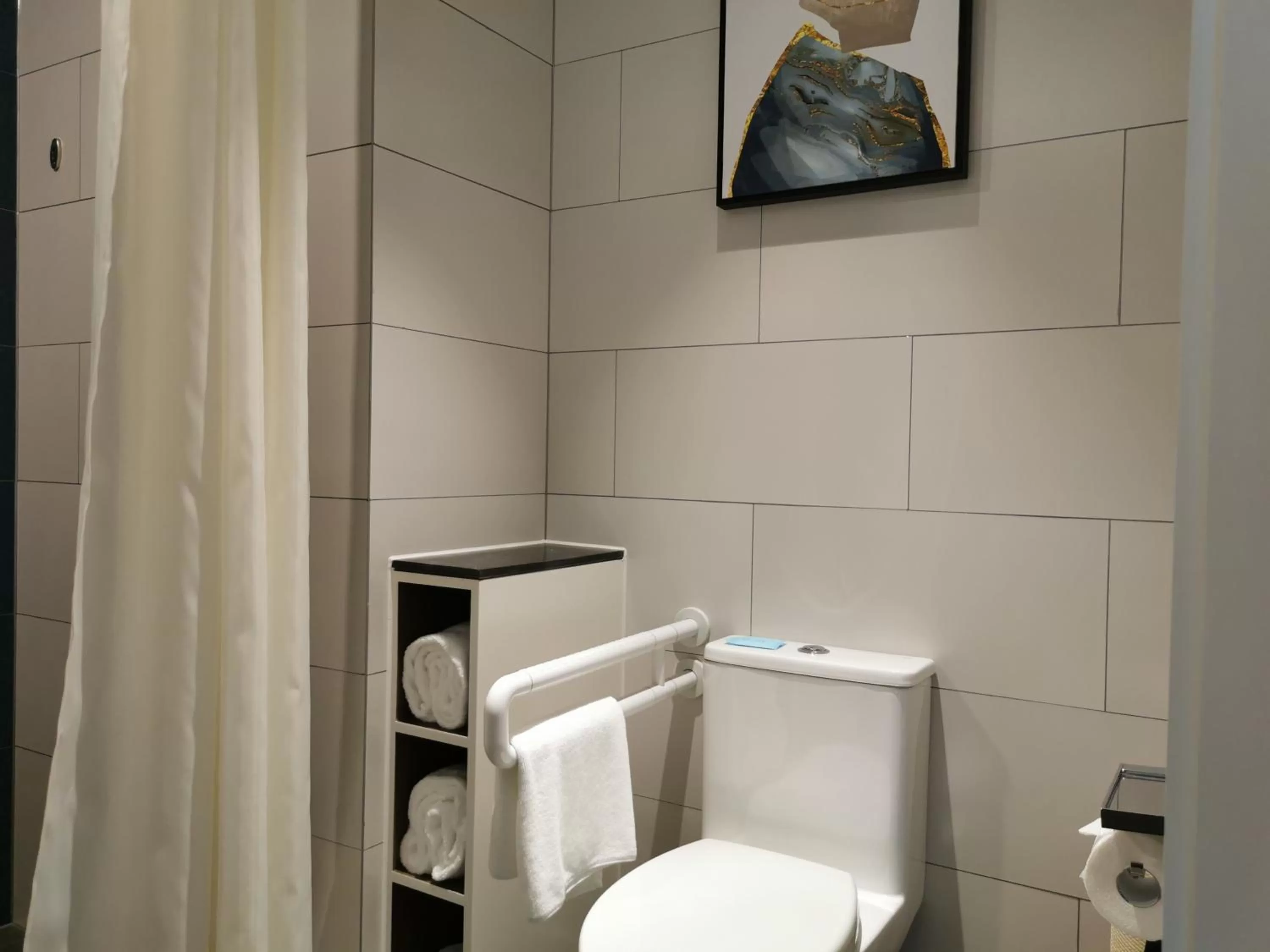 Toilet in Holiday Inn Express Shanghai Kangqiao by IHG