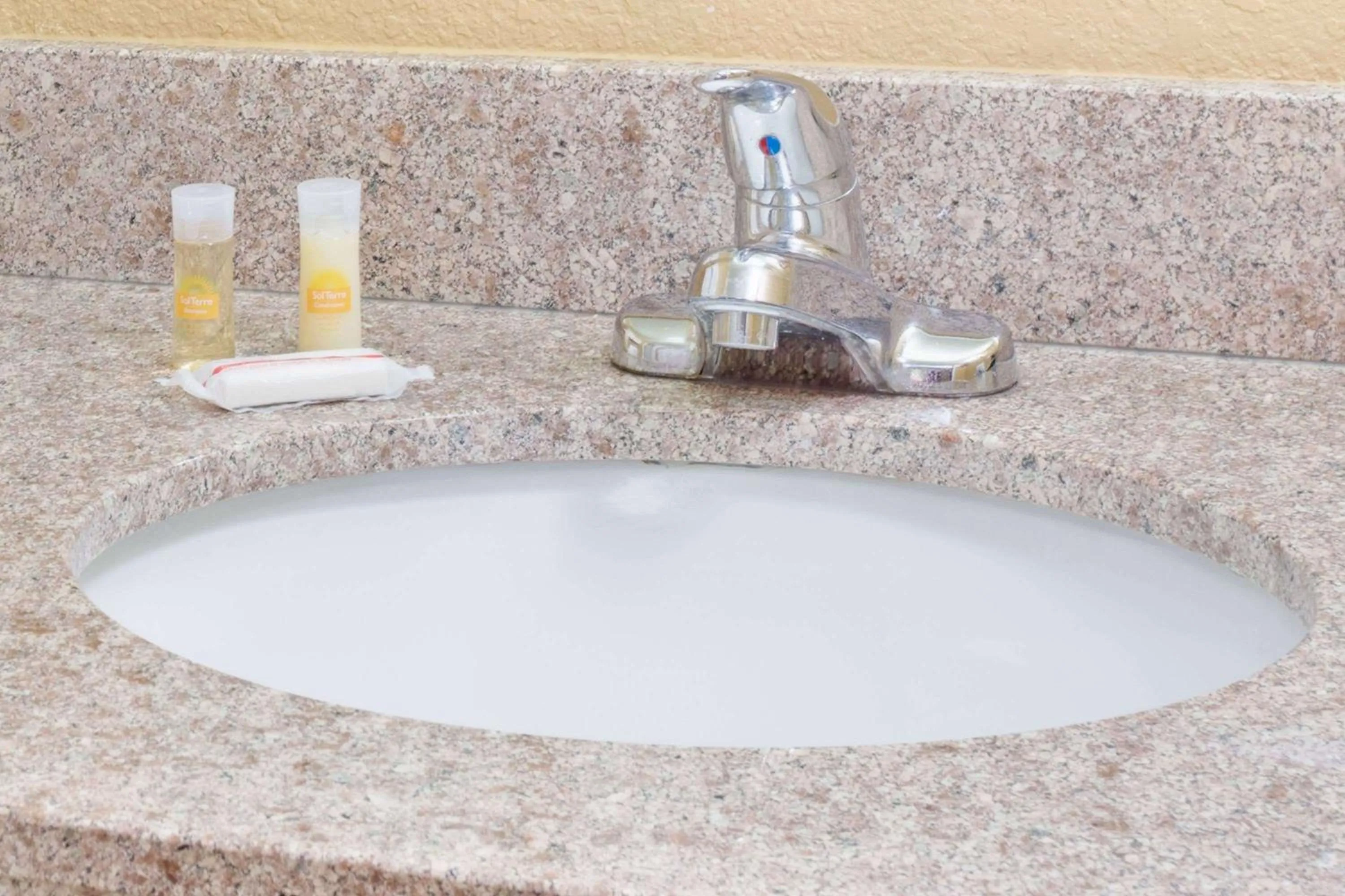 Bathroom in Days Inn by Wyndham Lawrenceville