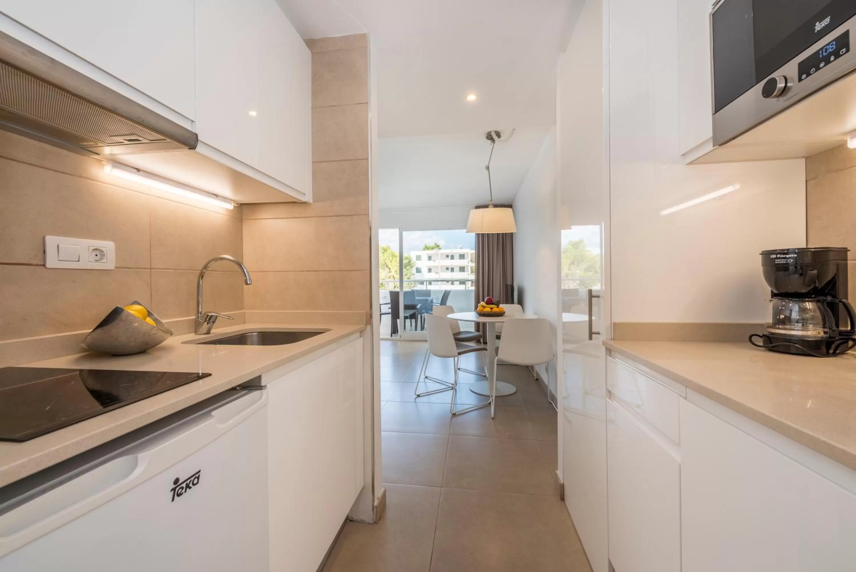 Kitchen or kitchenette in Camelina Suites