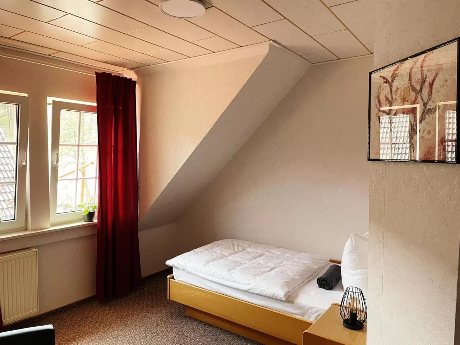 Bed in Hotel Rehkitz