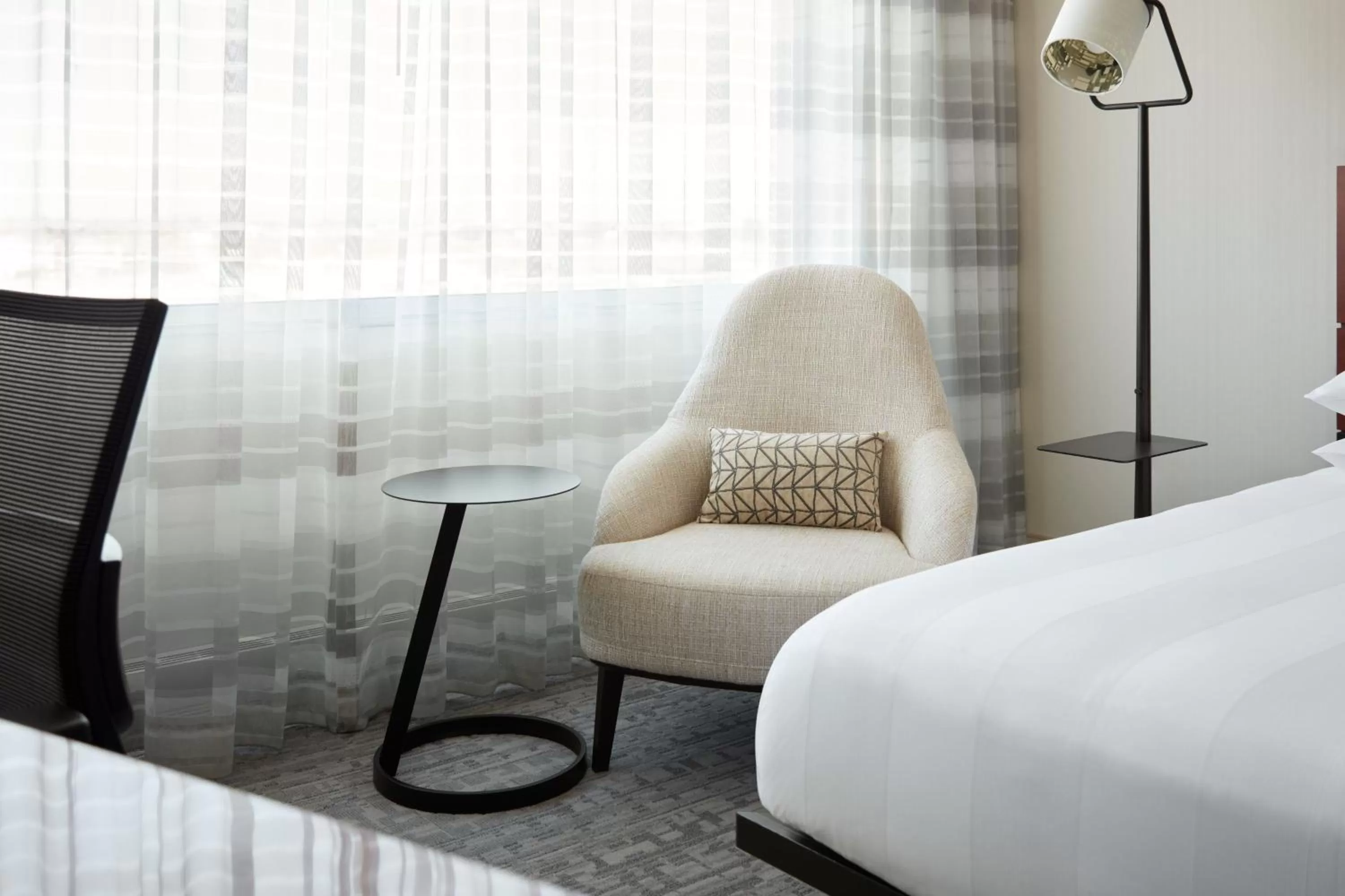 Photo of the whole room, Bed in Marriott Montreal Airport In-Terminal Hotel