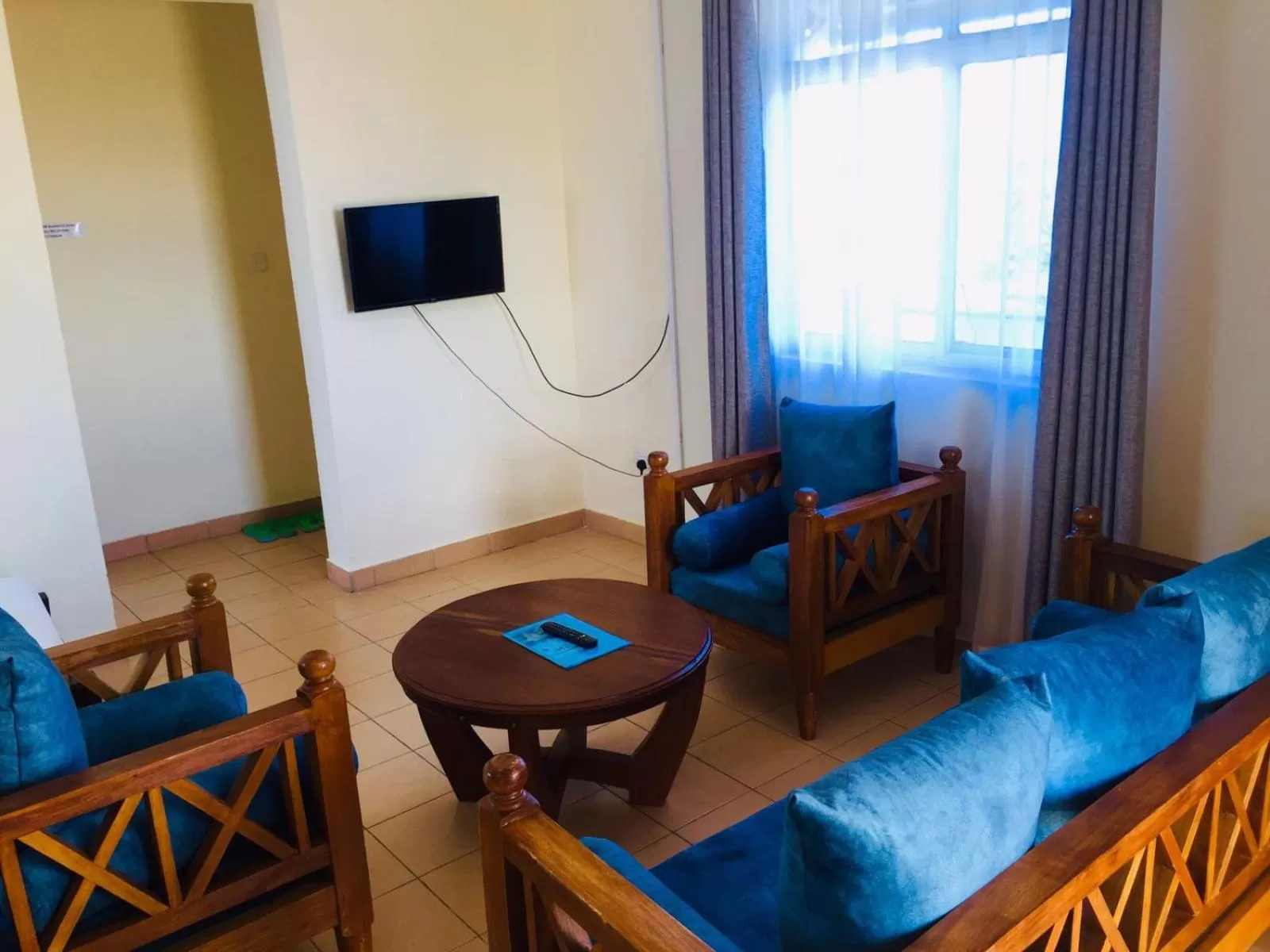 TV and multimedia in Merry Villa Hotel & Apartments