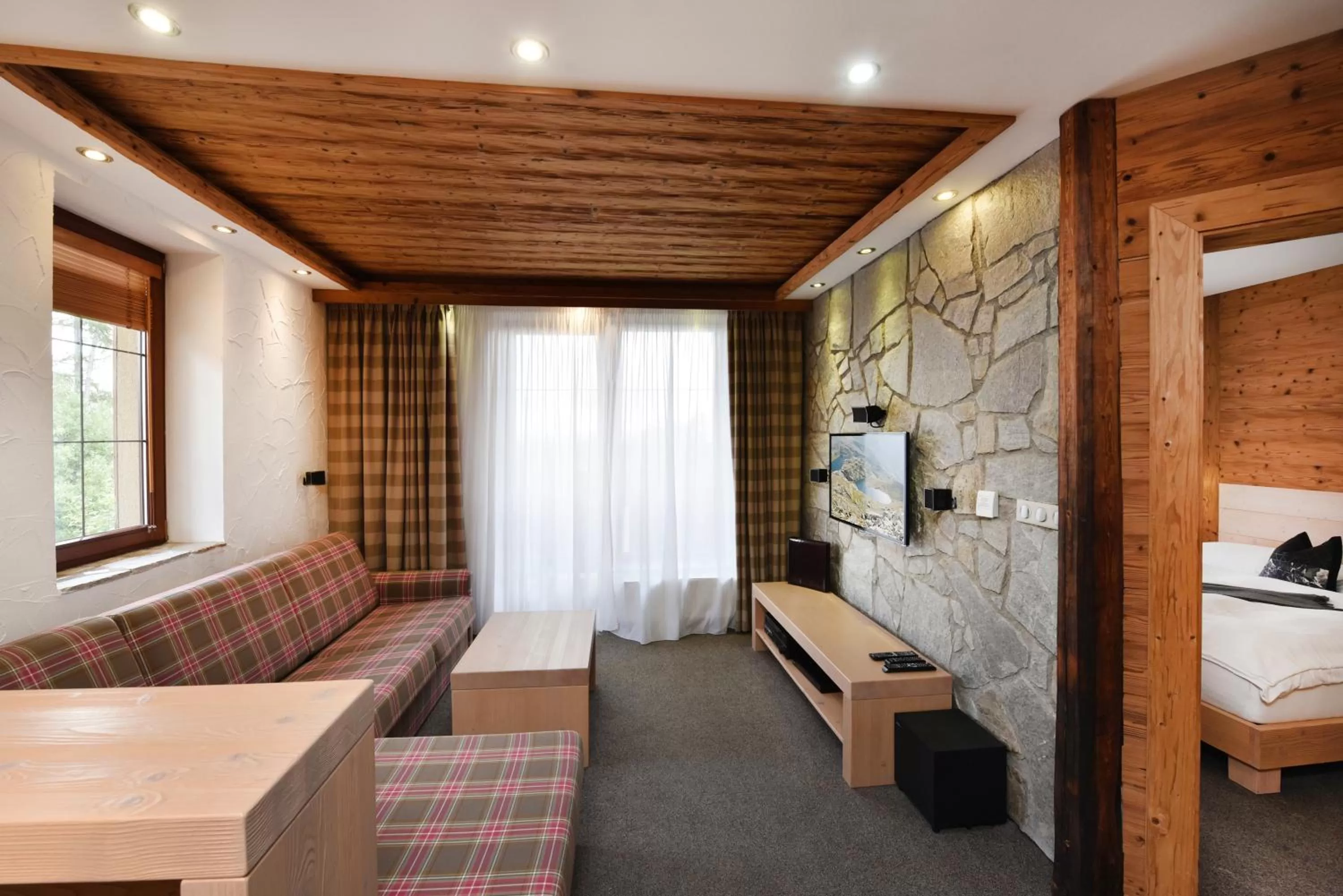 Living room, Bed in APLEND Hotel Kukučka