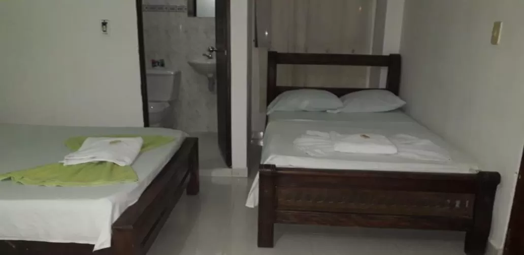 Bed in Hotel Mansión del Cesar