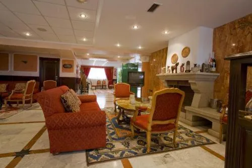 Communal lounge/ TV room in Hotel Begoña Park