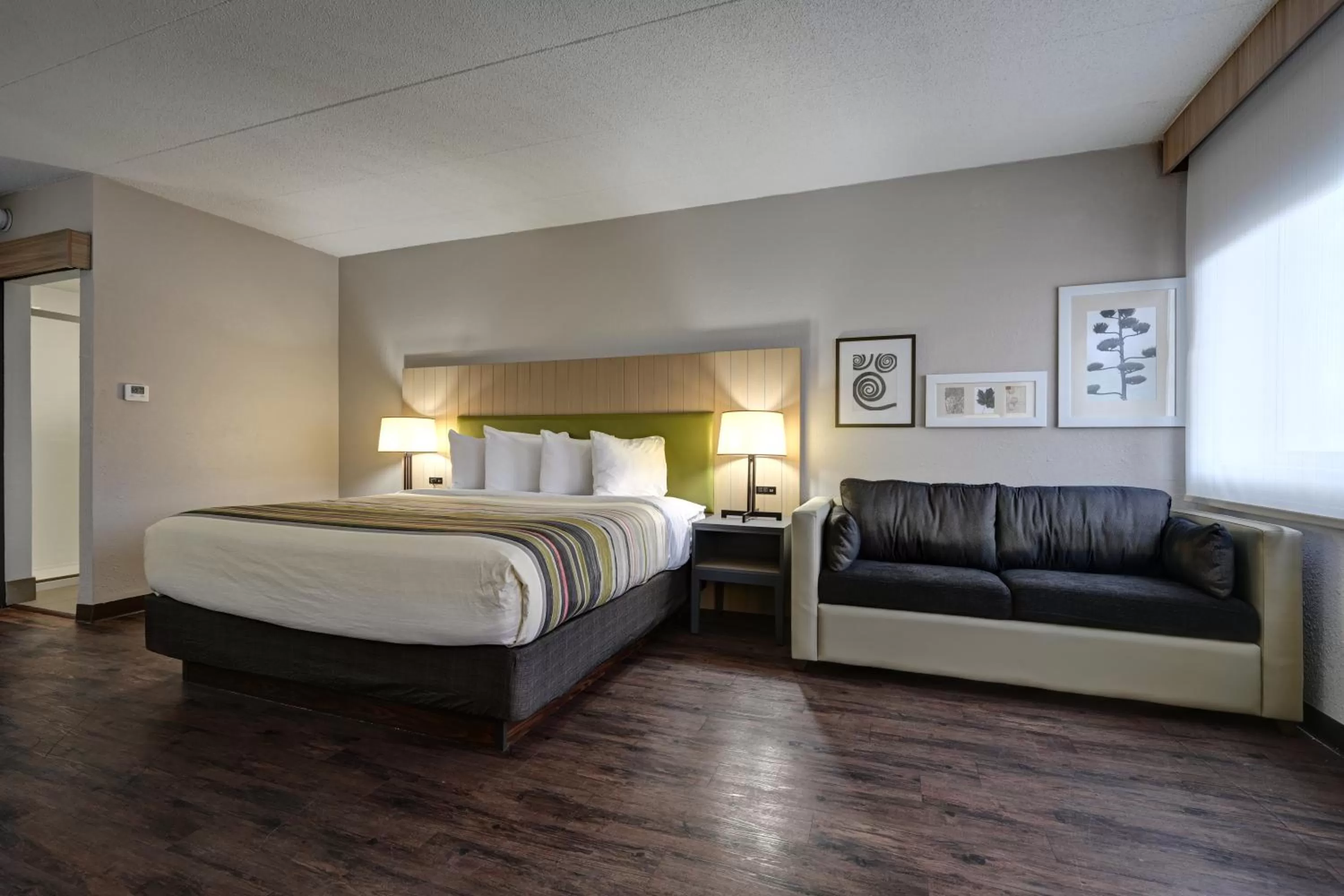 Bed in Country Inn & Suites by Radisson, Pierre, SD