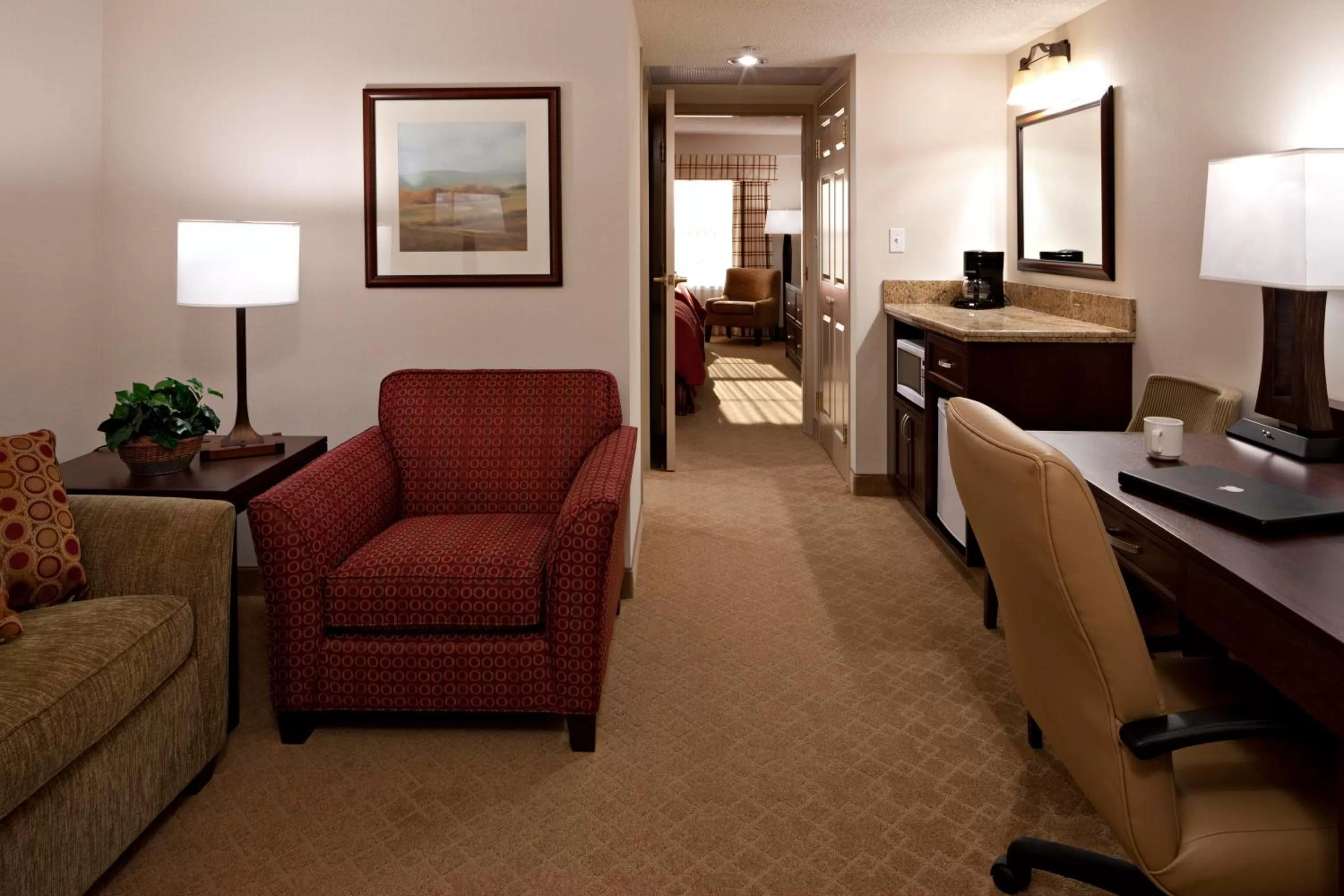 Living room, Bed in Country Inn & Suites by Radisson, Calgary-Northeast