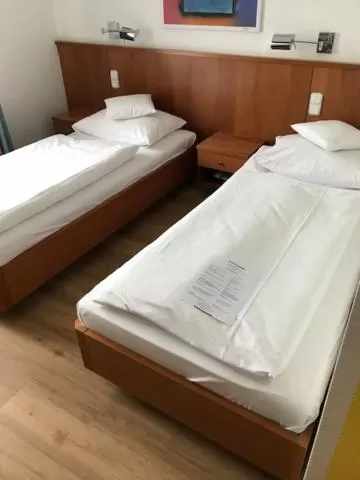 Bed in Seminar- und Urlaubshotel Schulz
