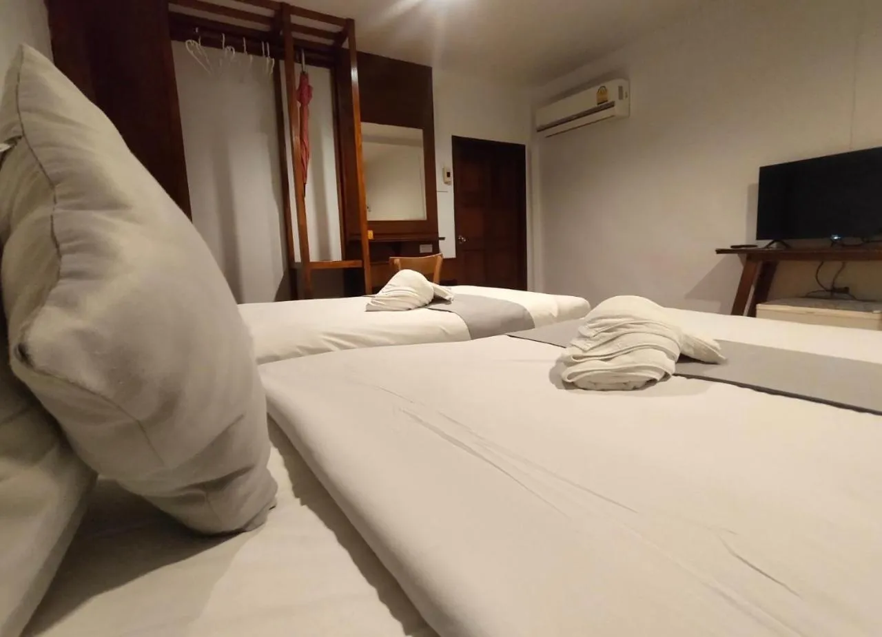 Bed in Lanta Nice Beach Resort - SHA Extra Plus