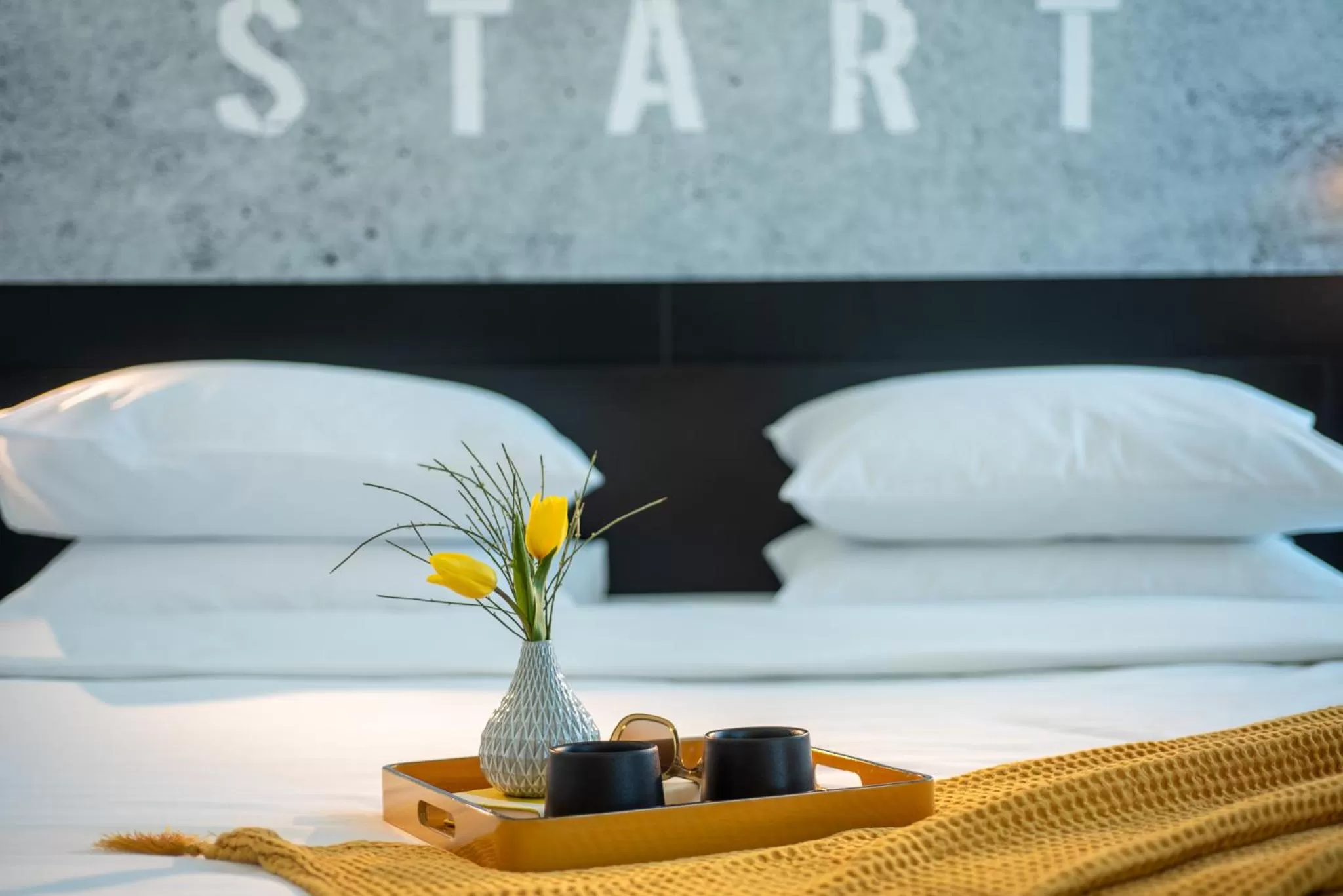 Bed in BY14 TLV Hotel