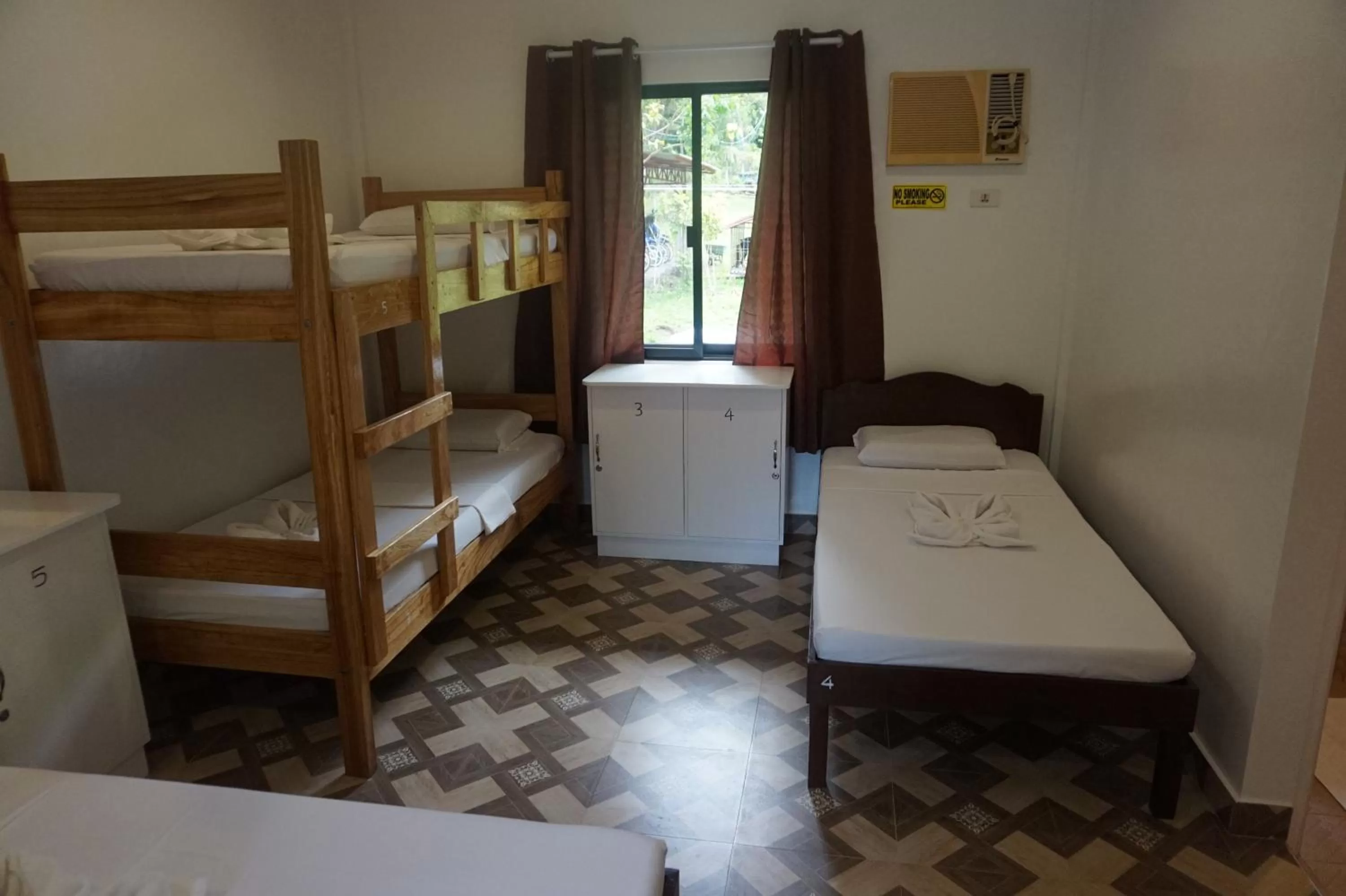 Photo of the whole room, Bed in Wellbeach Dive Resort