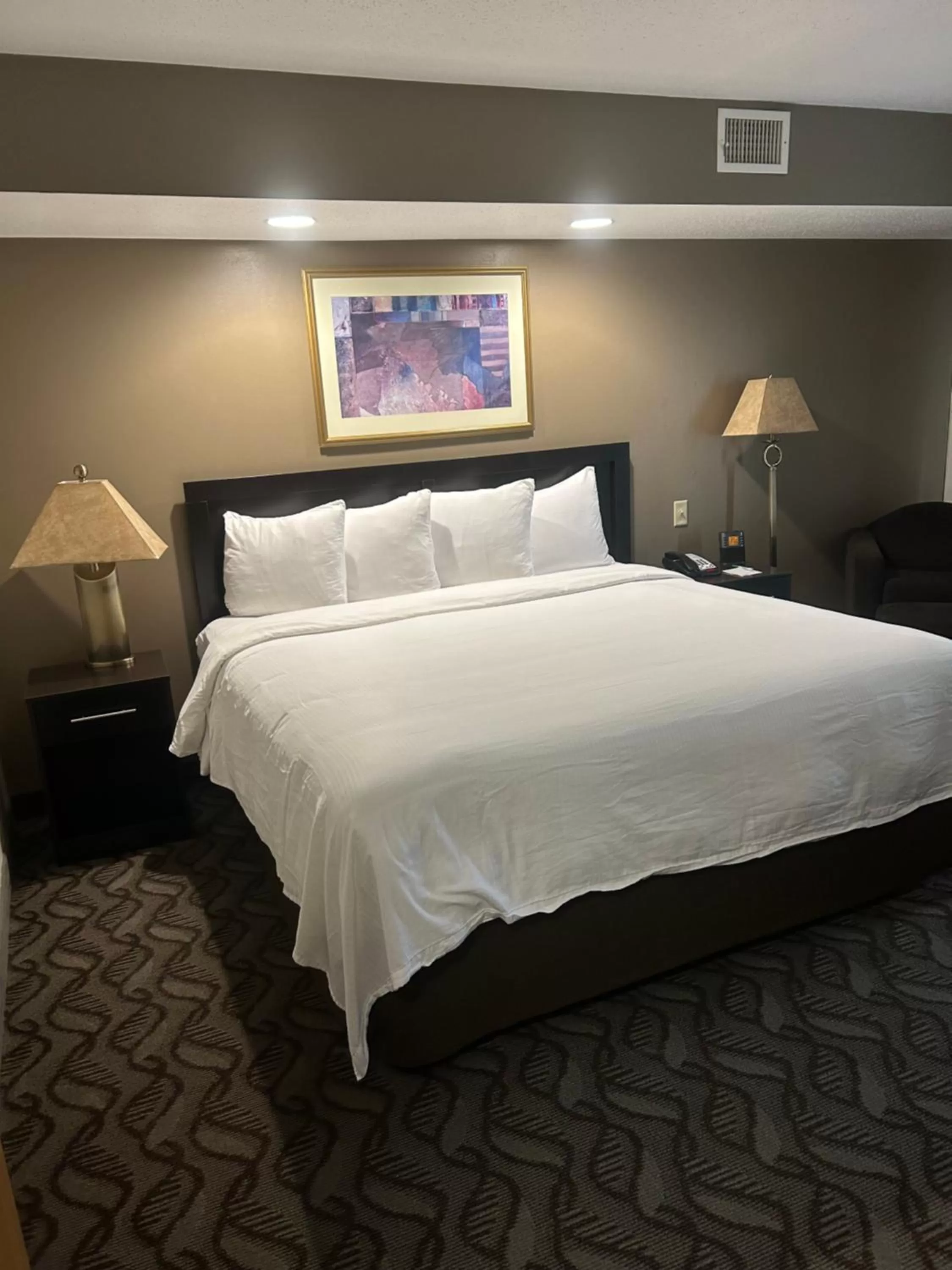 Bed in Wyndham Garden Madison Fitchburg