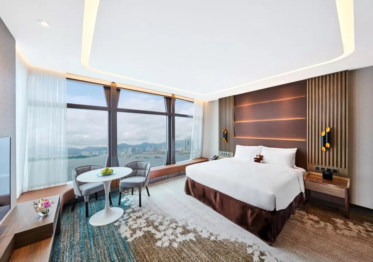 Seating area, Bed in Oasis Aurum 181 Hotel