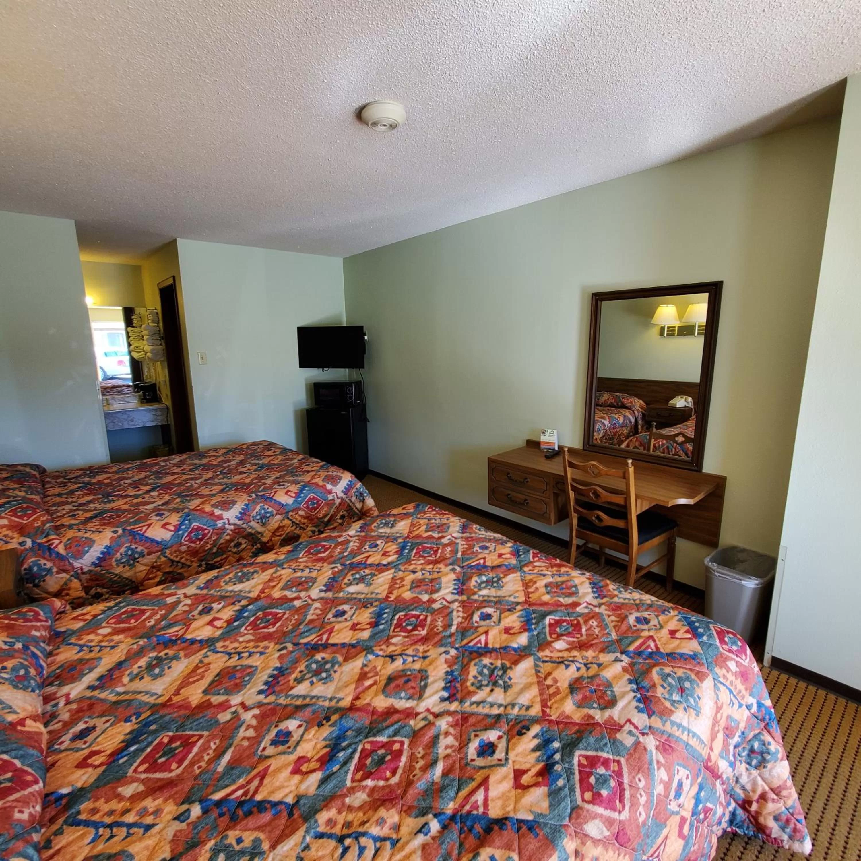 Bed in Robin Hood Motel