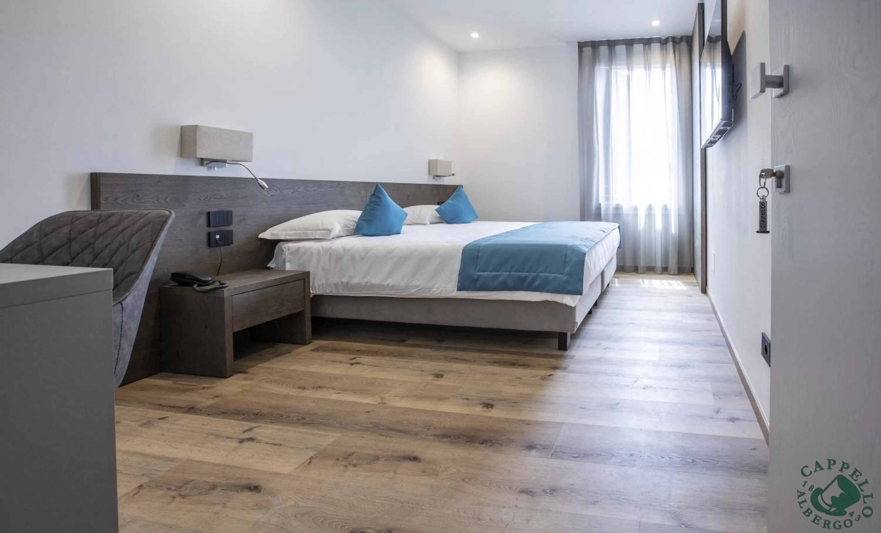 Bed in Albergo Cappello e Cadore