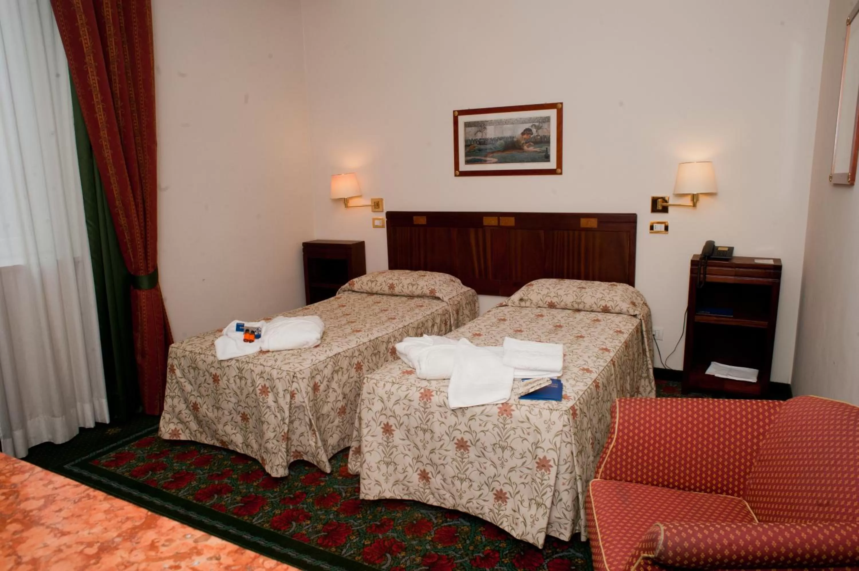 Bed in Hotel Candiani