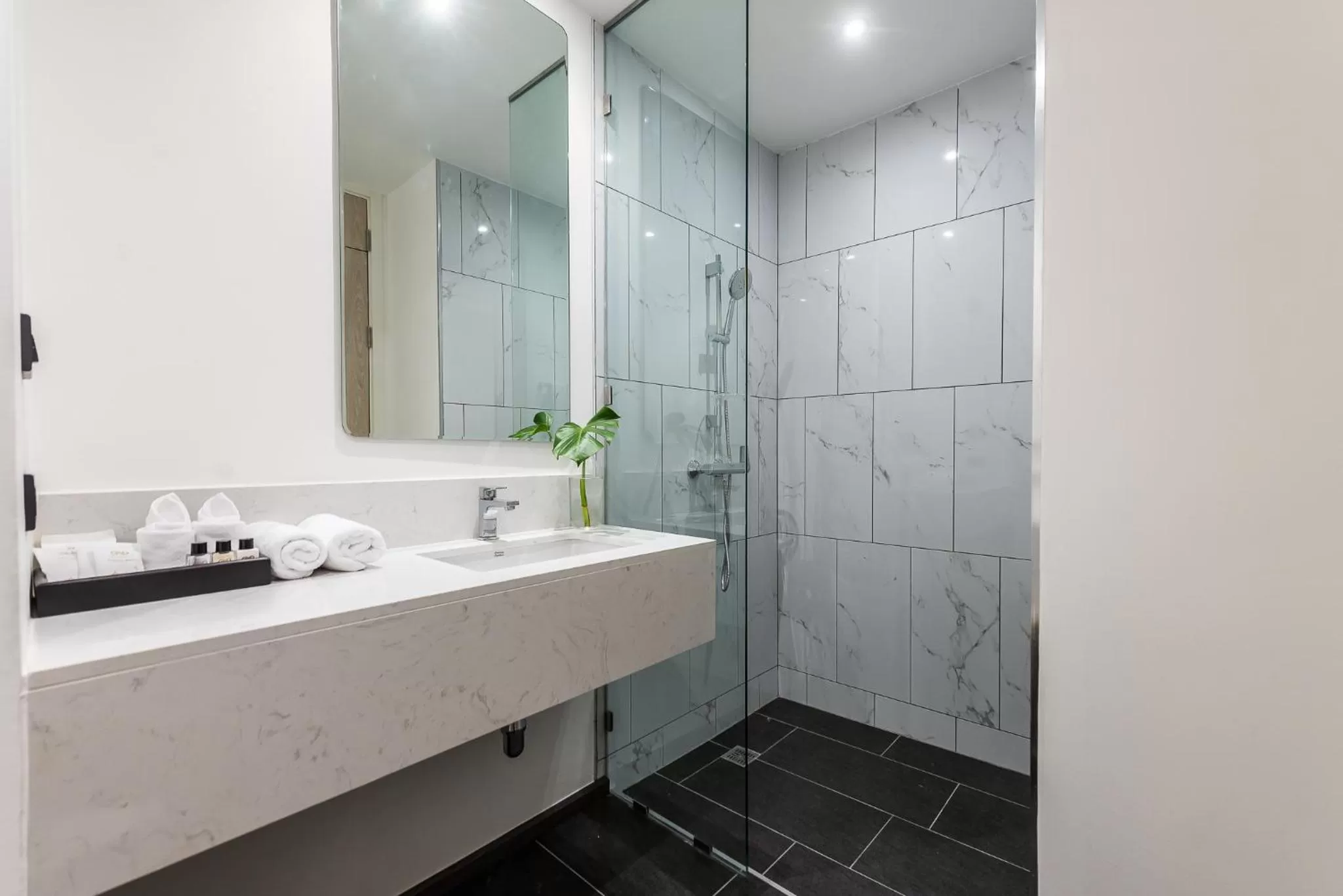 Bathroom in One Patio Hotel Pattaya - SHA Extra Plus