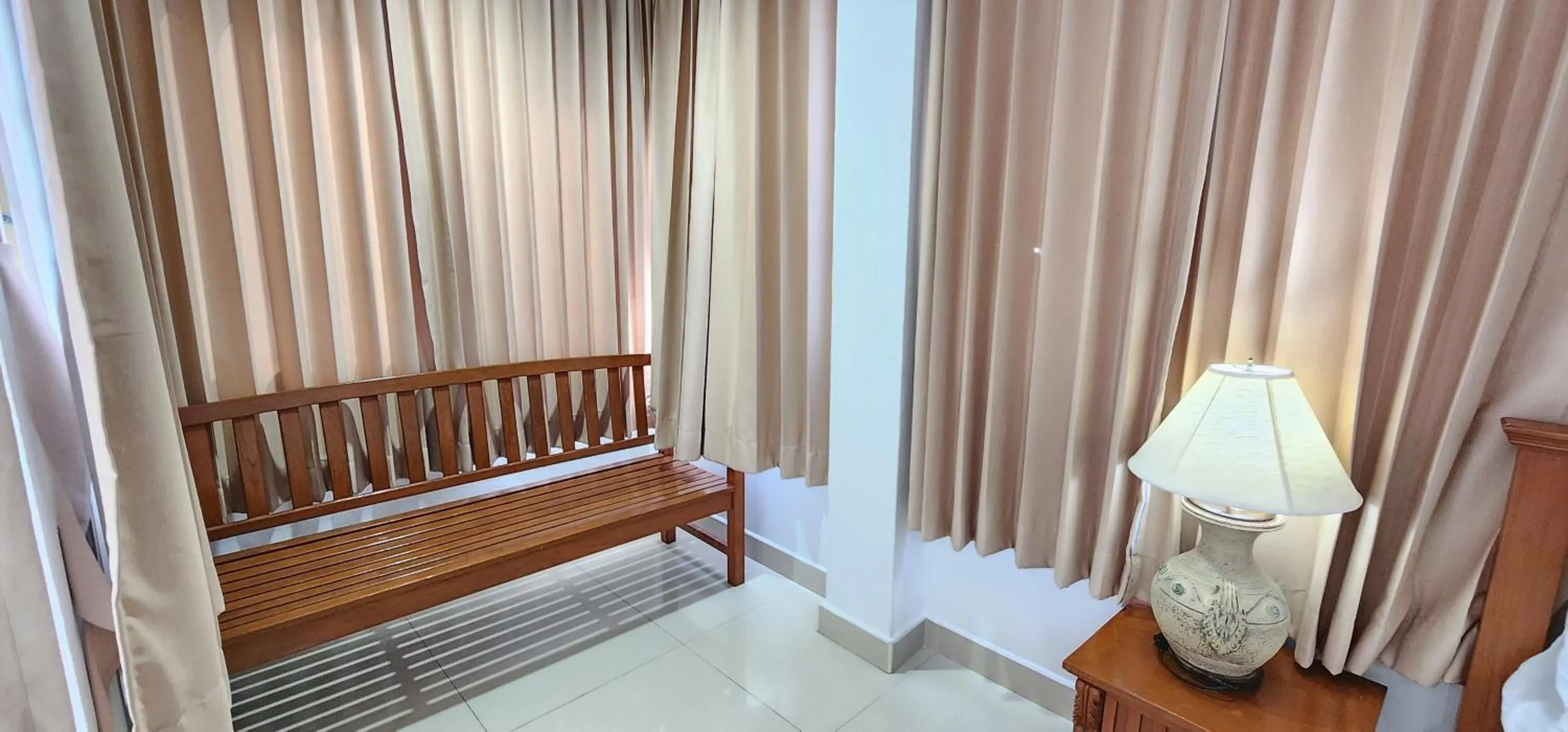 Seating area, Bed in Royal Sweet Hotel