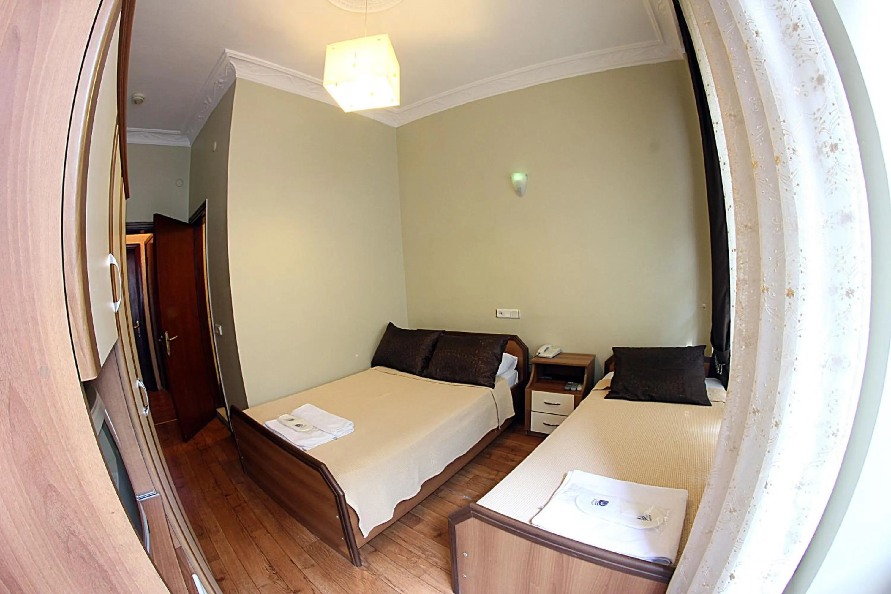 Photo of the whole room, Bed in Paradise Hotel