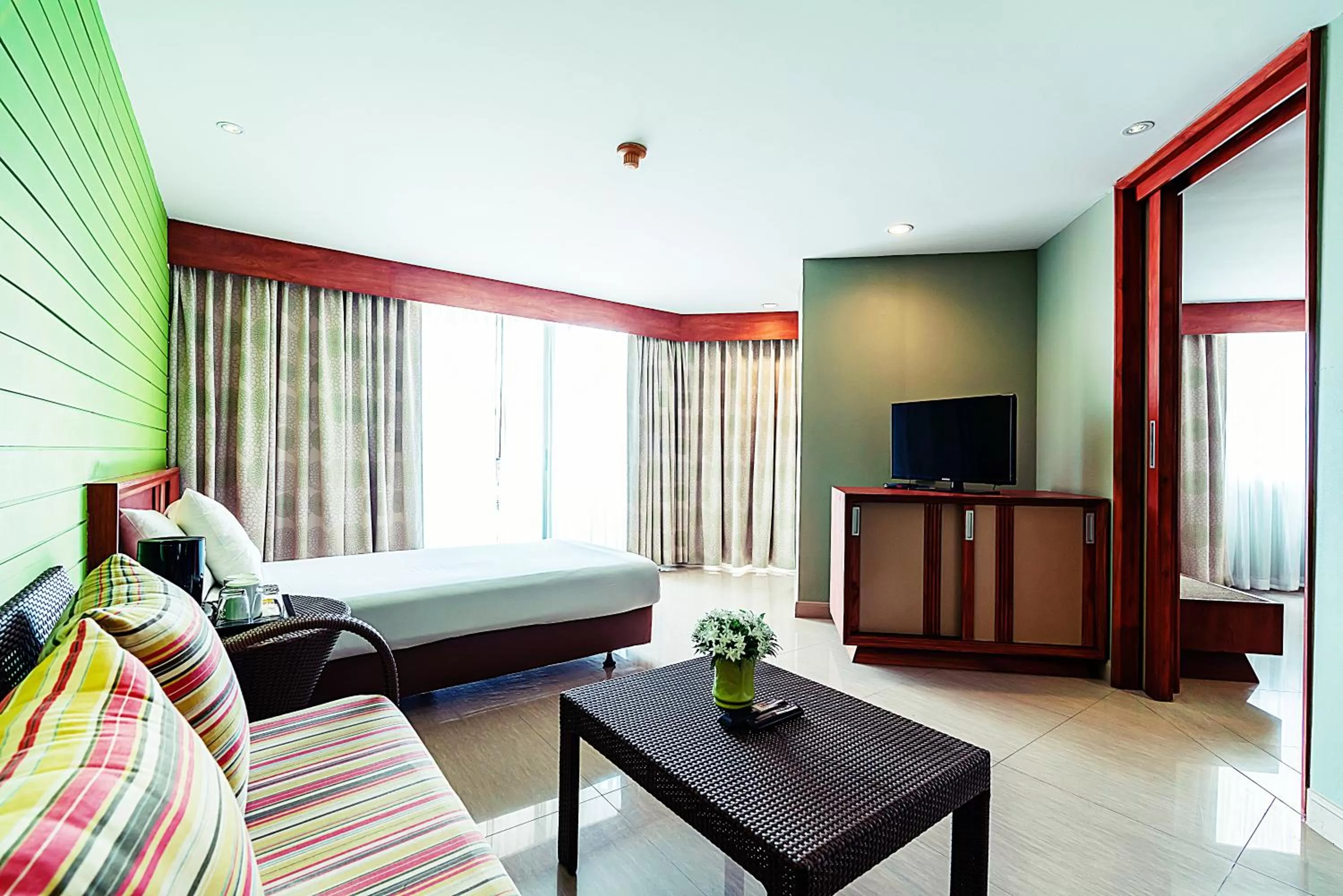 Bed in Long Beach Cha-Am Hotel