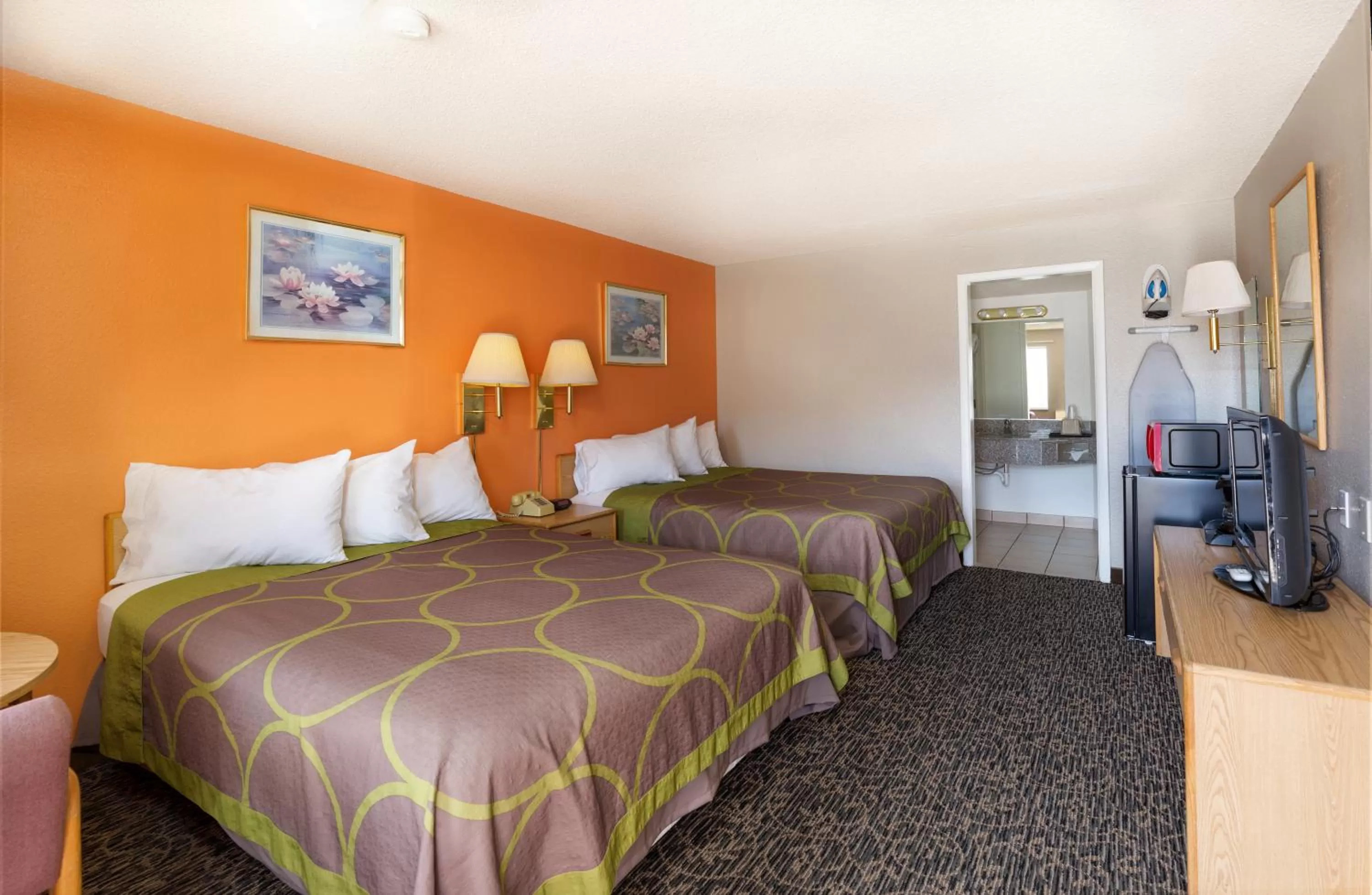 Bed in Bardmoor Suites