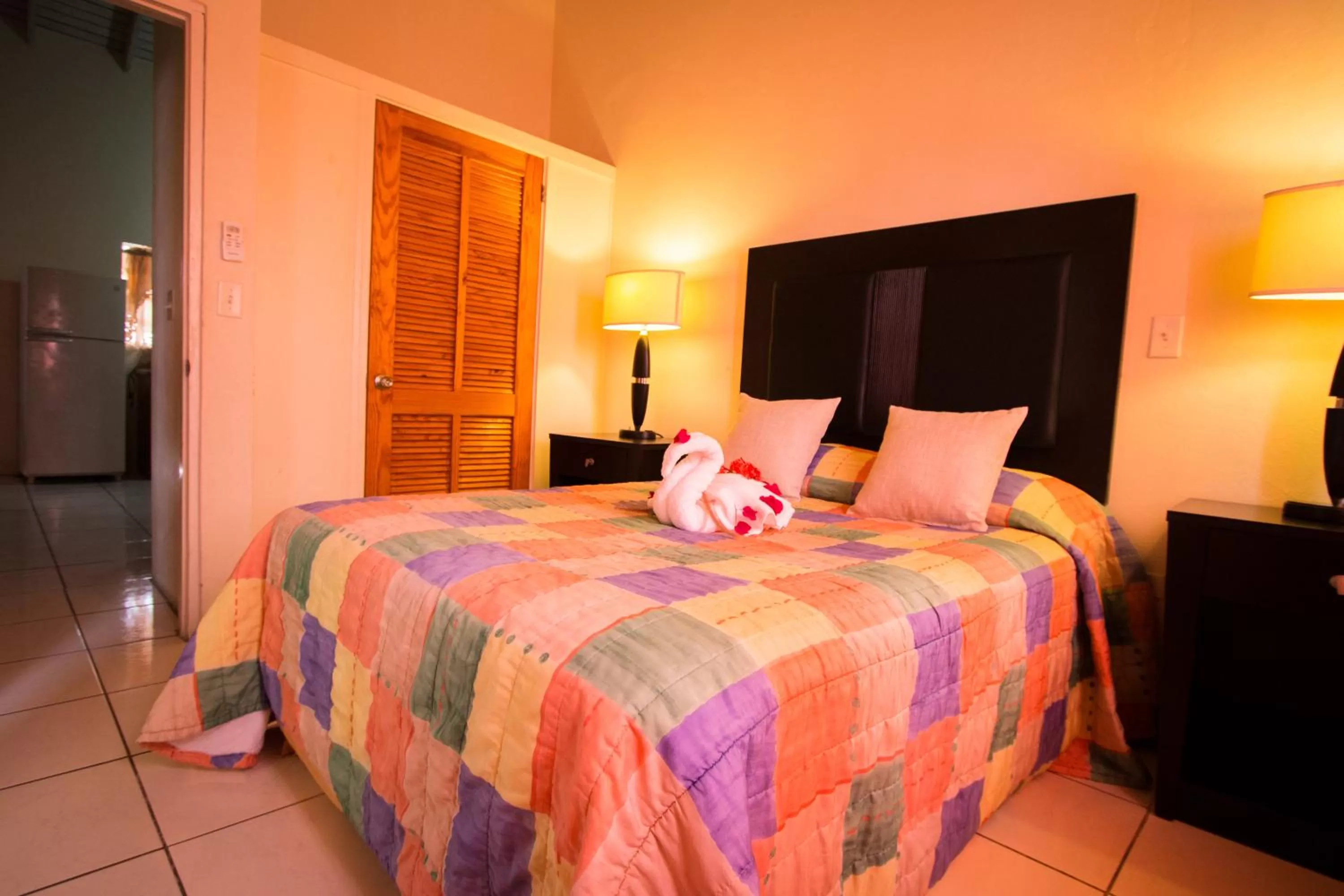 Bed in Connie's Comfort Suites