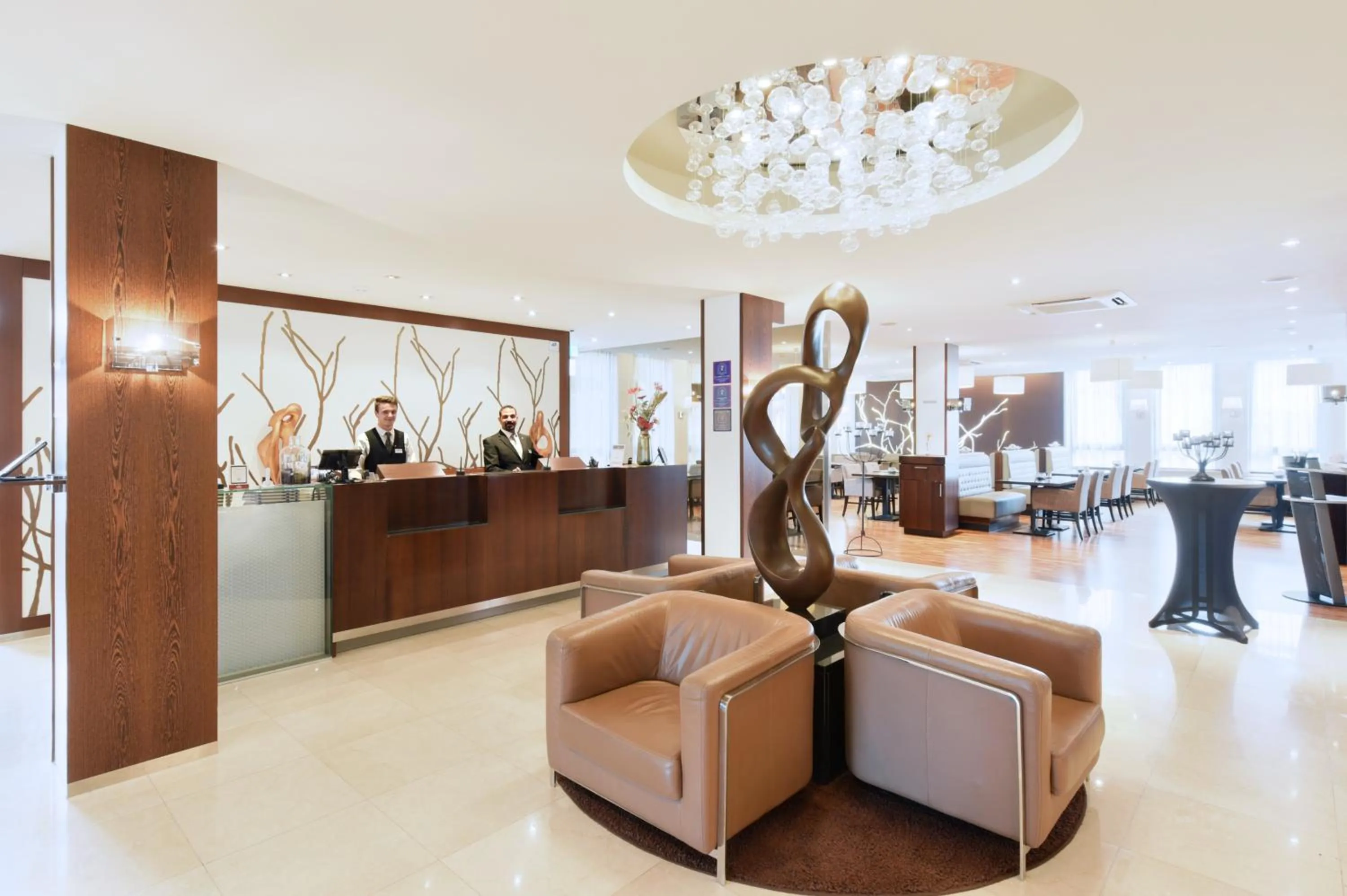 Lobby or reception in ACHAT Hotel München Süd